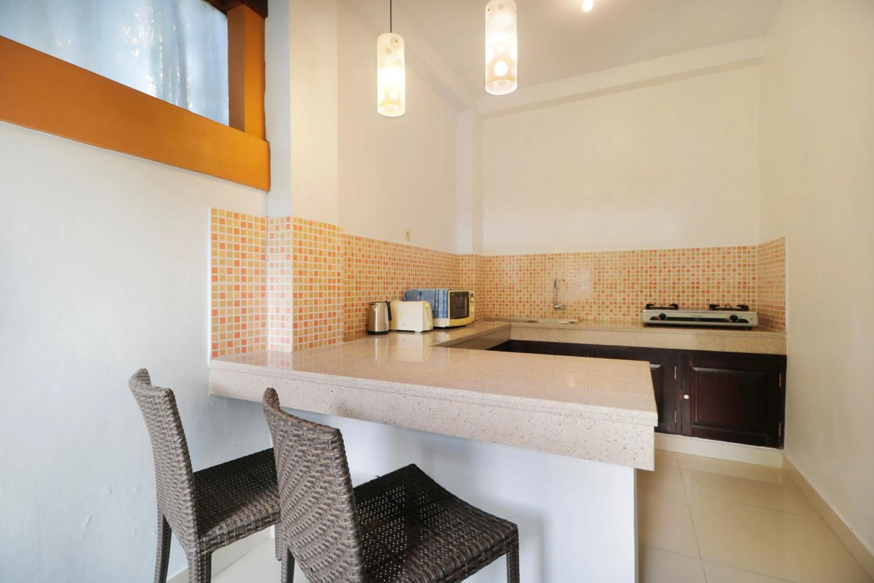 Kitchen or kitchenette in Heliconia Villa