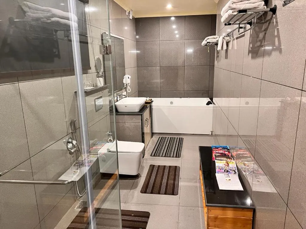 Shower in The Orchard Retreat & Spa