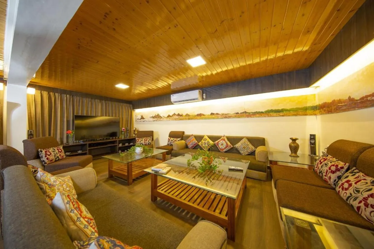 Communal lounge/ TV room in The Orchard Retreat & Spa