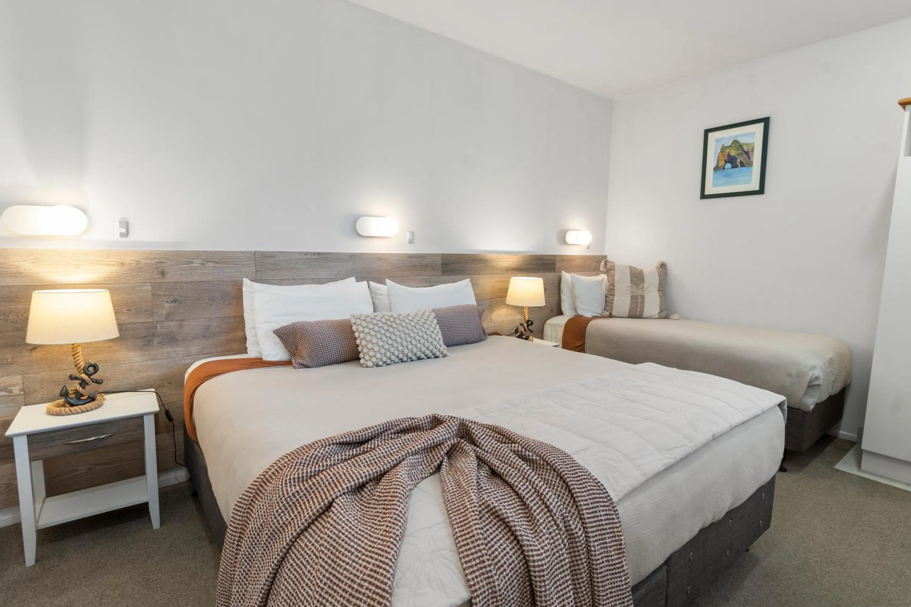 Bed in ASURE Admirals View Motel