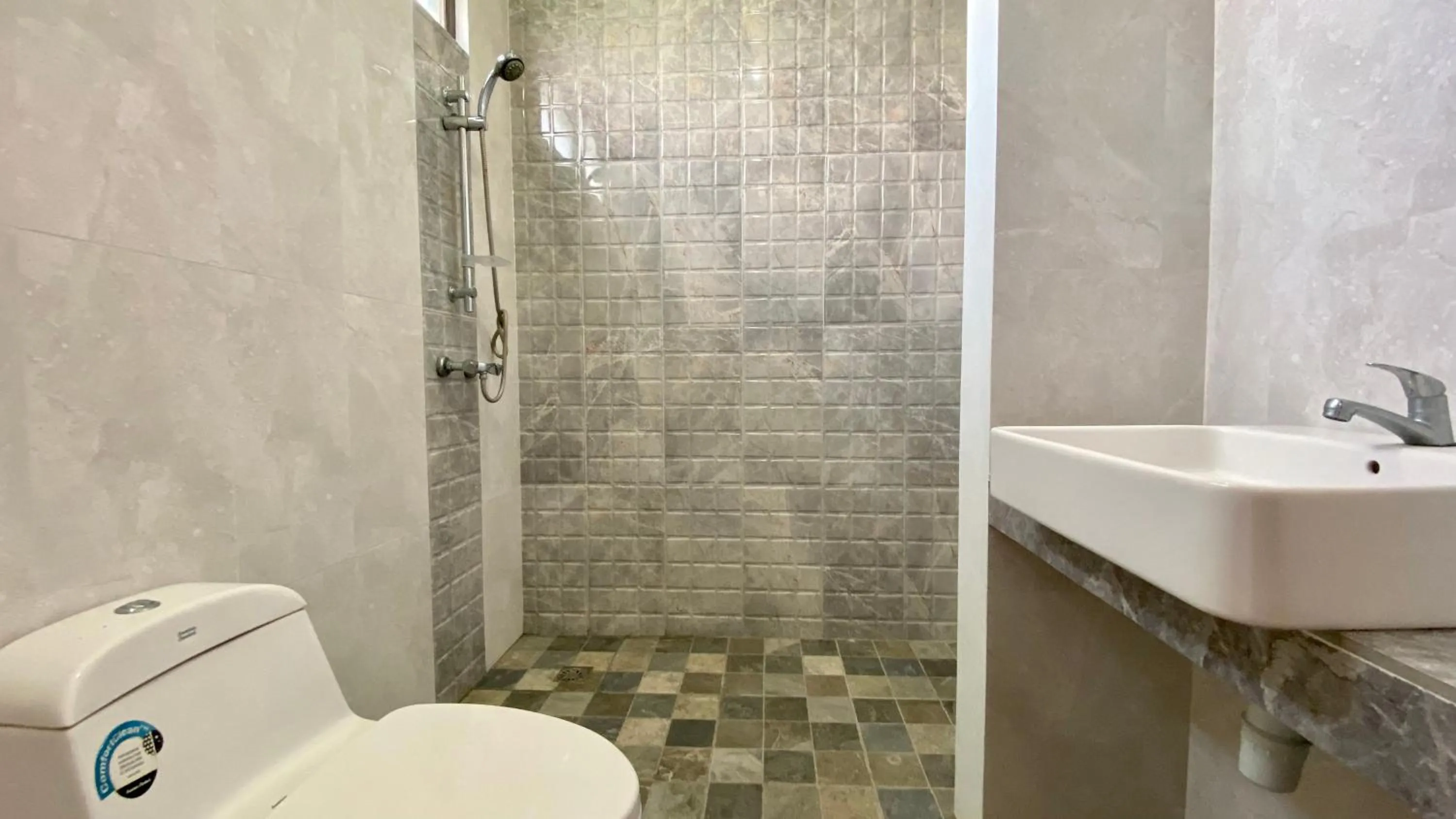 Bathroom in Simpang Inn Hotel