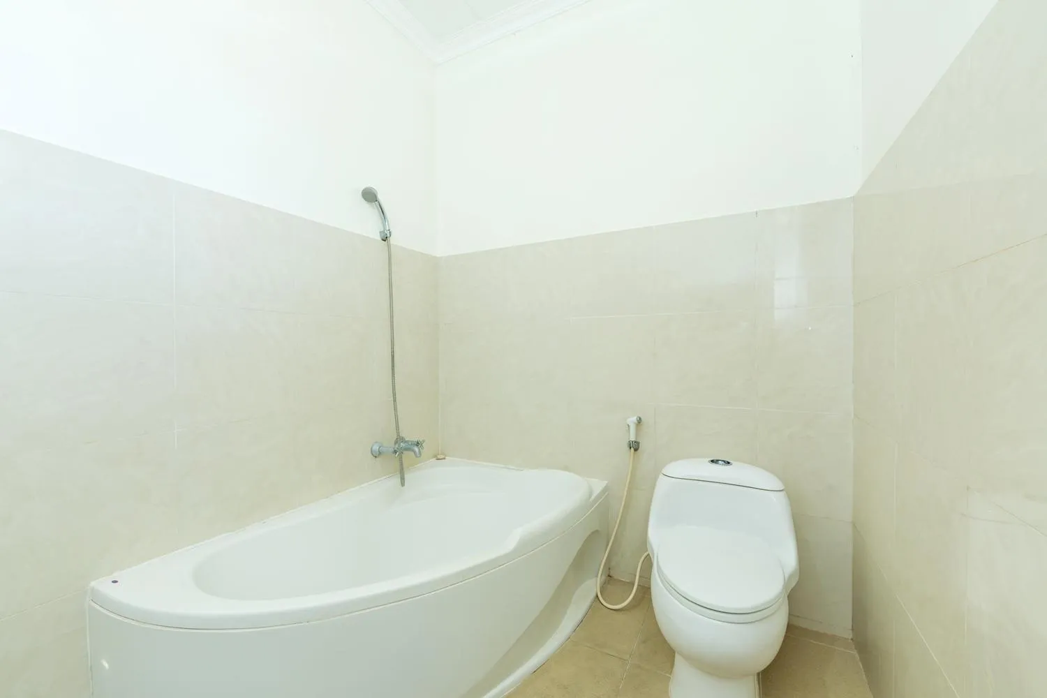 Bathroom in Simpang Inn Hotel