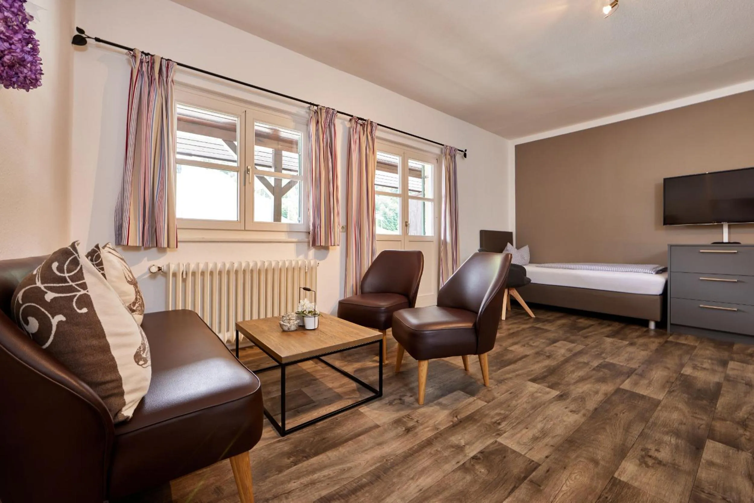 Seating area, Bed in Olympia Haus