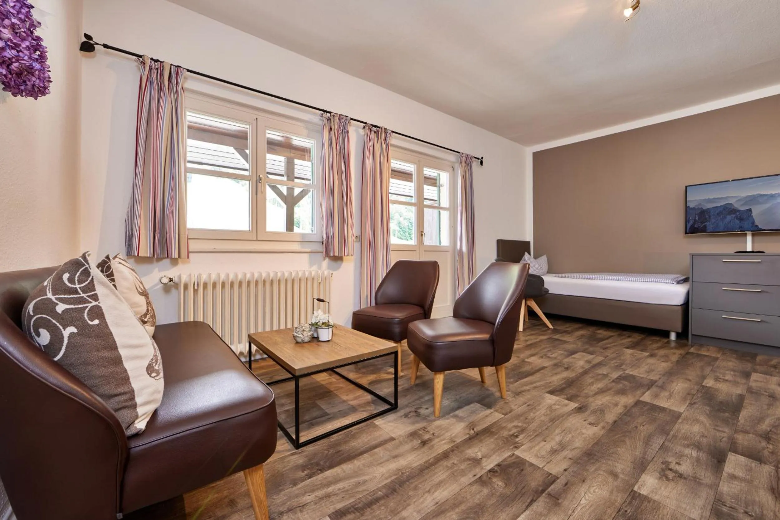 Seating area, Bed in Olympia Haus