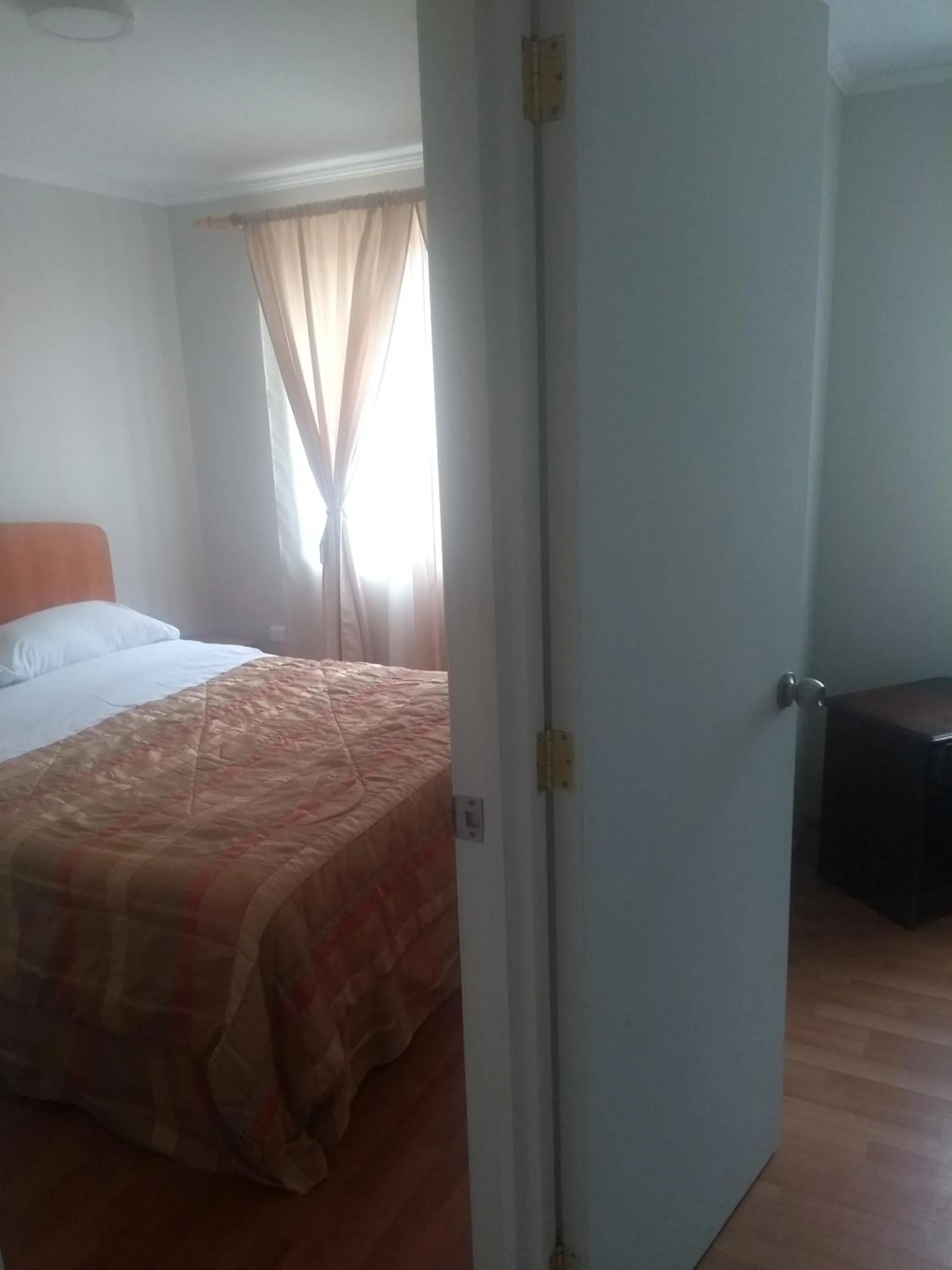 Bed in Departamento Familiar