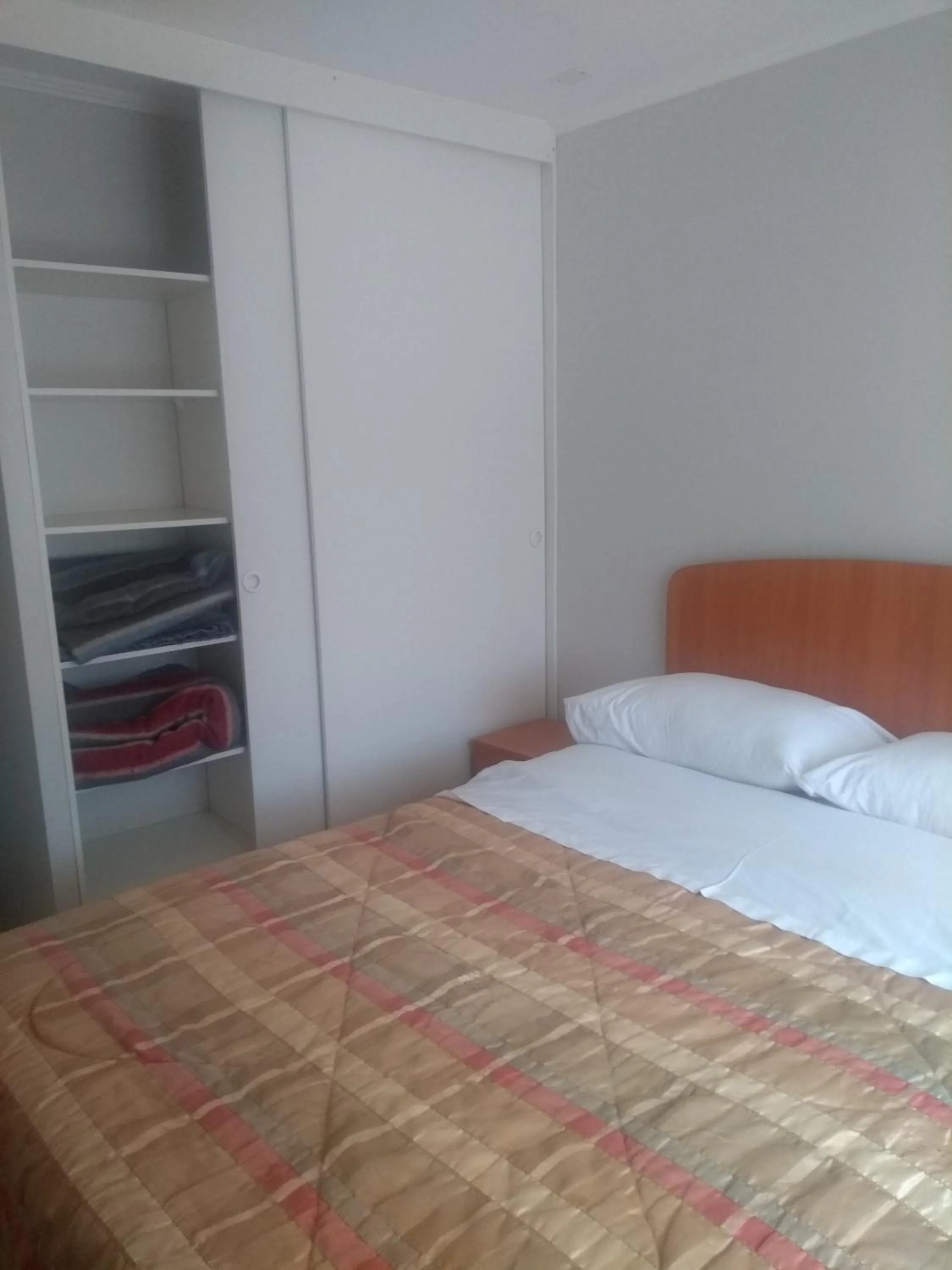 Bed in Departamento Familiar
