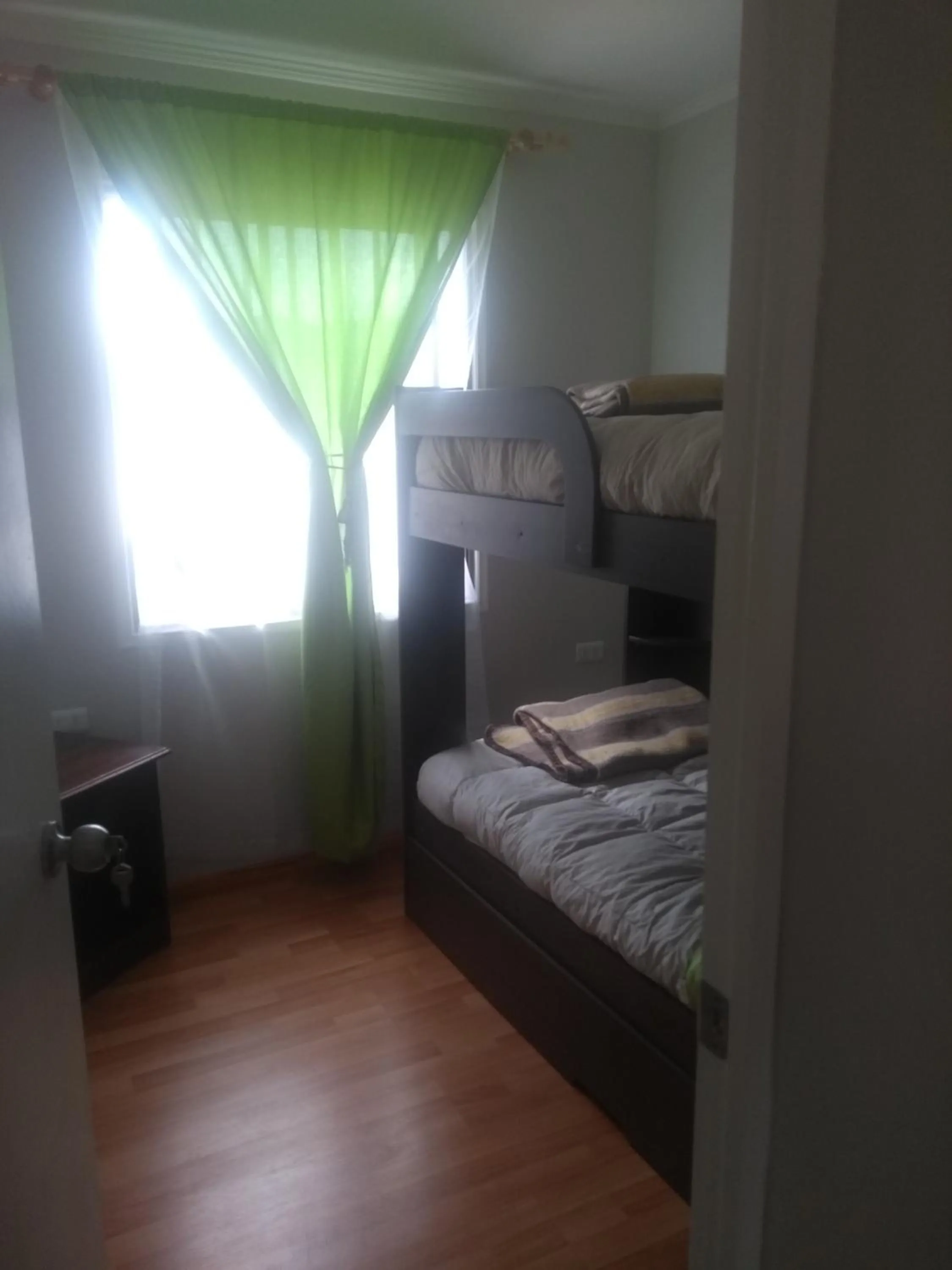 Bed in Departamento Familiar