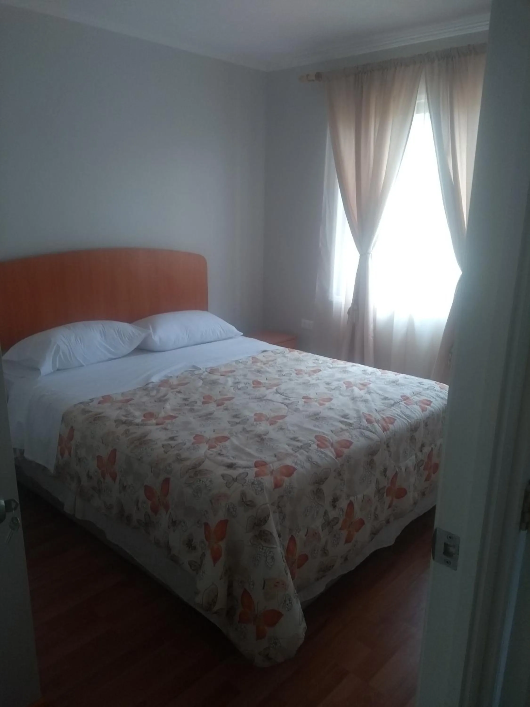 Bed in Departamento Familiar