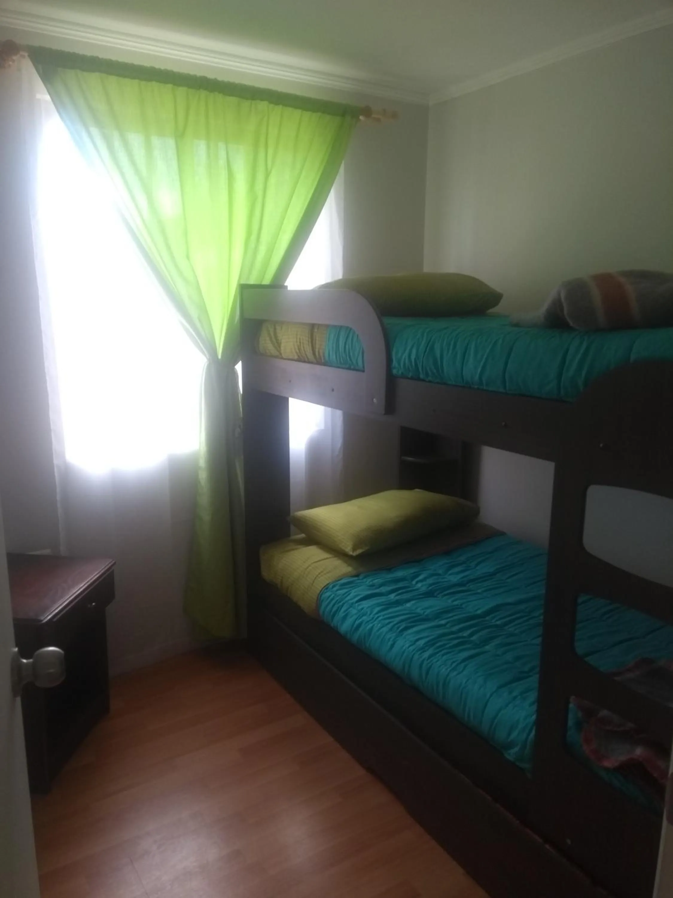 Bed in Departamento Familiar