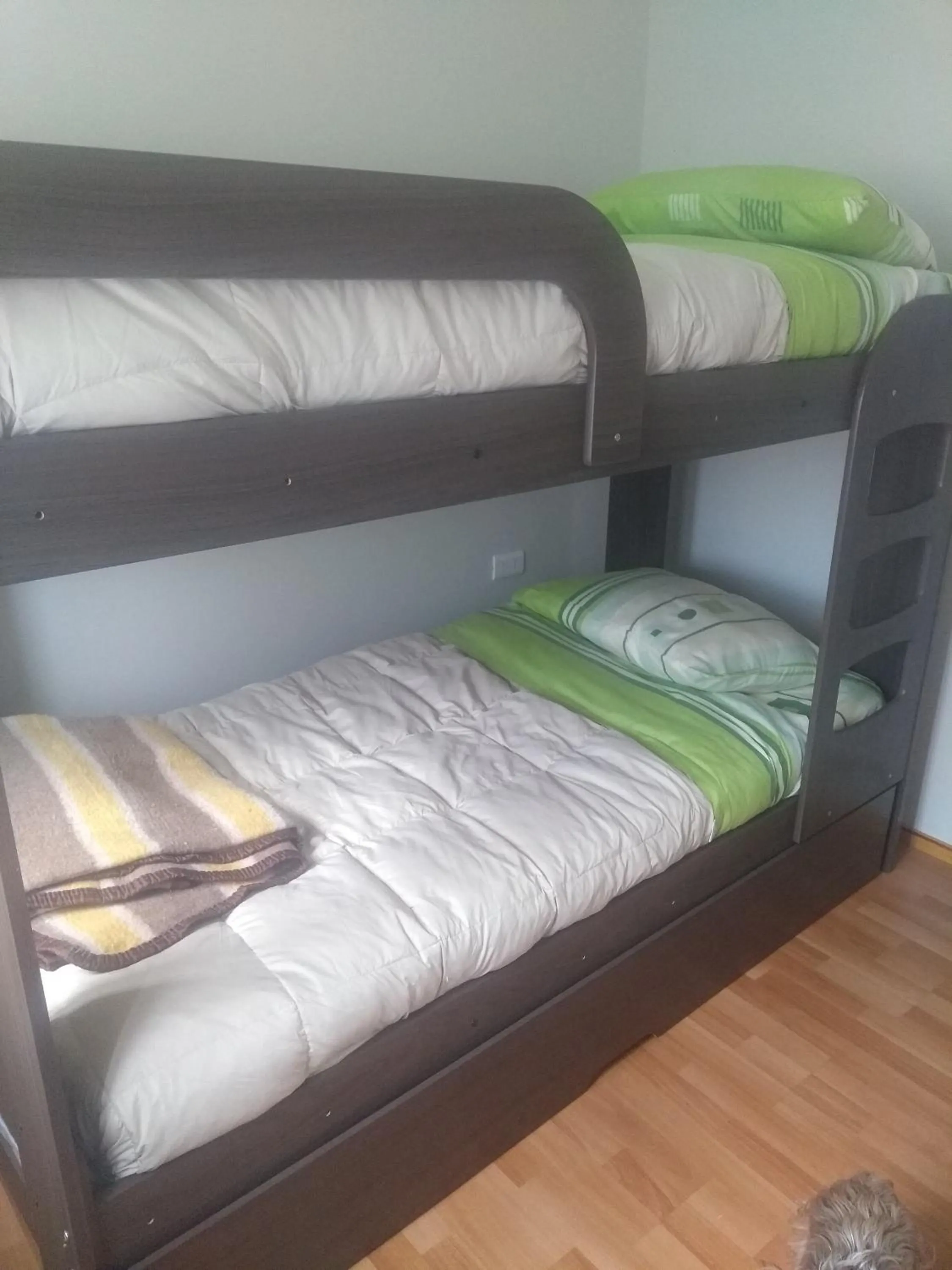 Bed in Departamento Familiar
