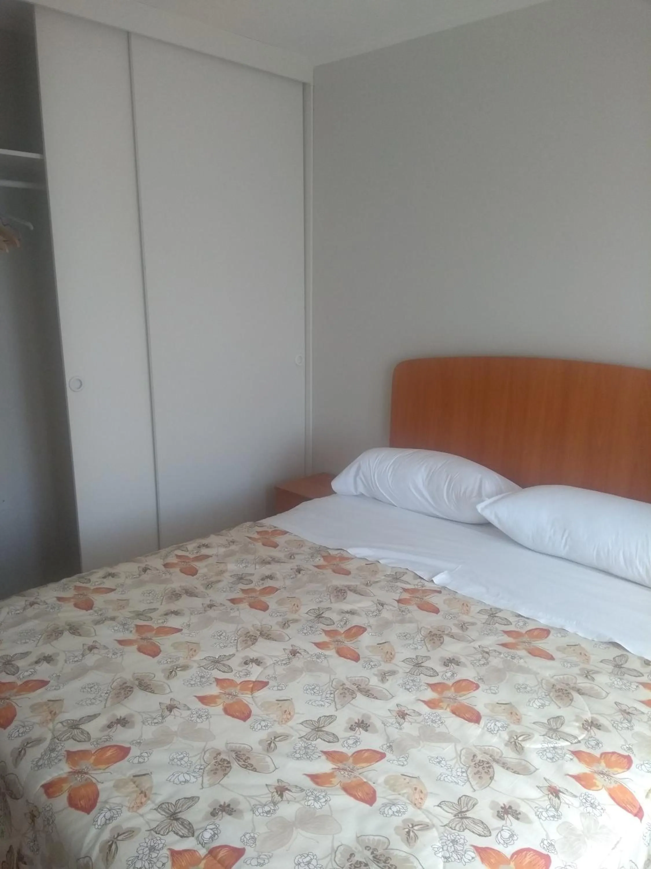 Bed in Departamento Familiar