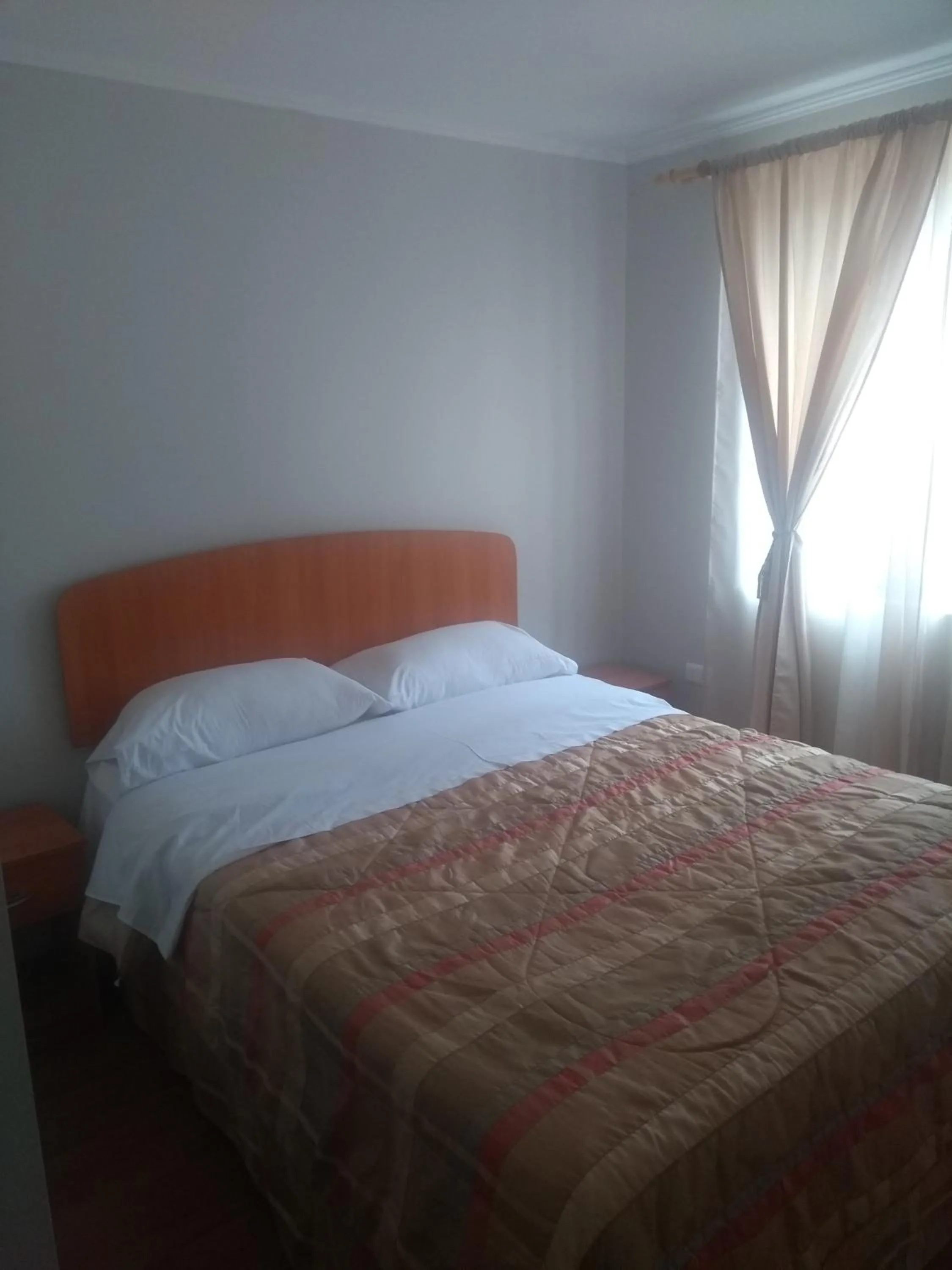 Bed in Departamento Familiar