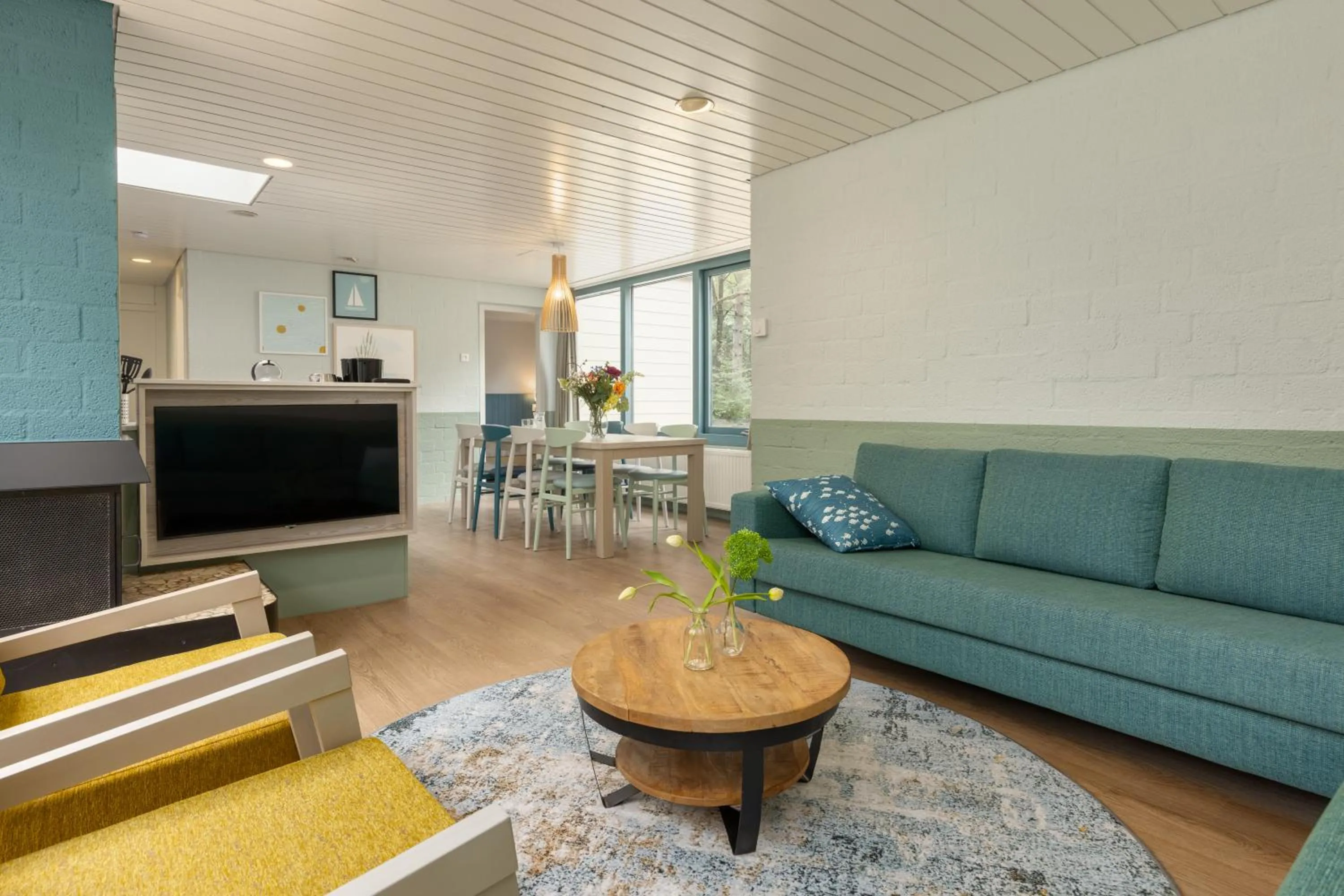 Communal lounge/ TV room in Center Parcs Vossemeren