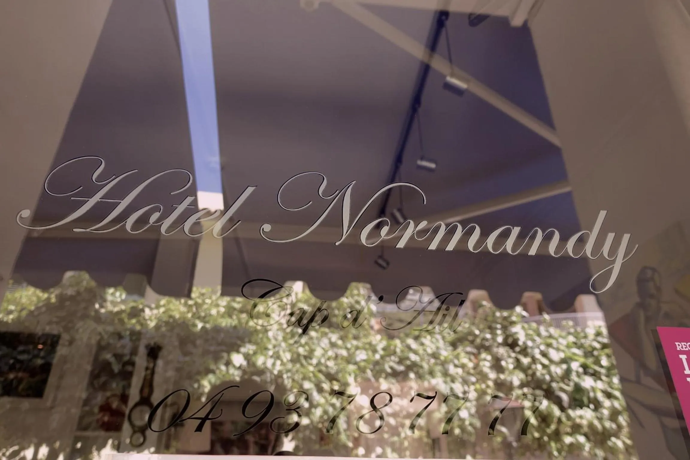 Property logo or sign in Hotel Normandy