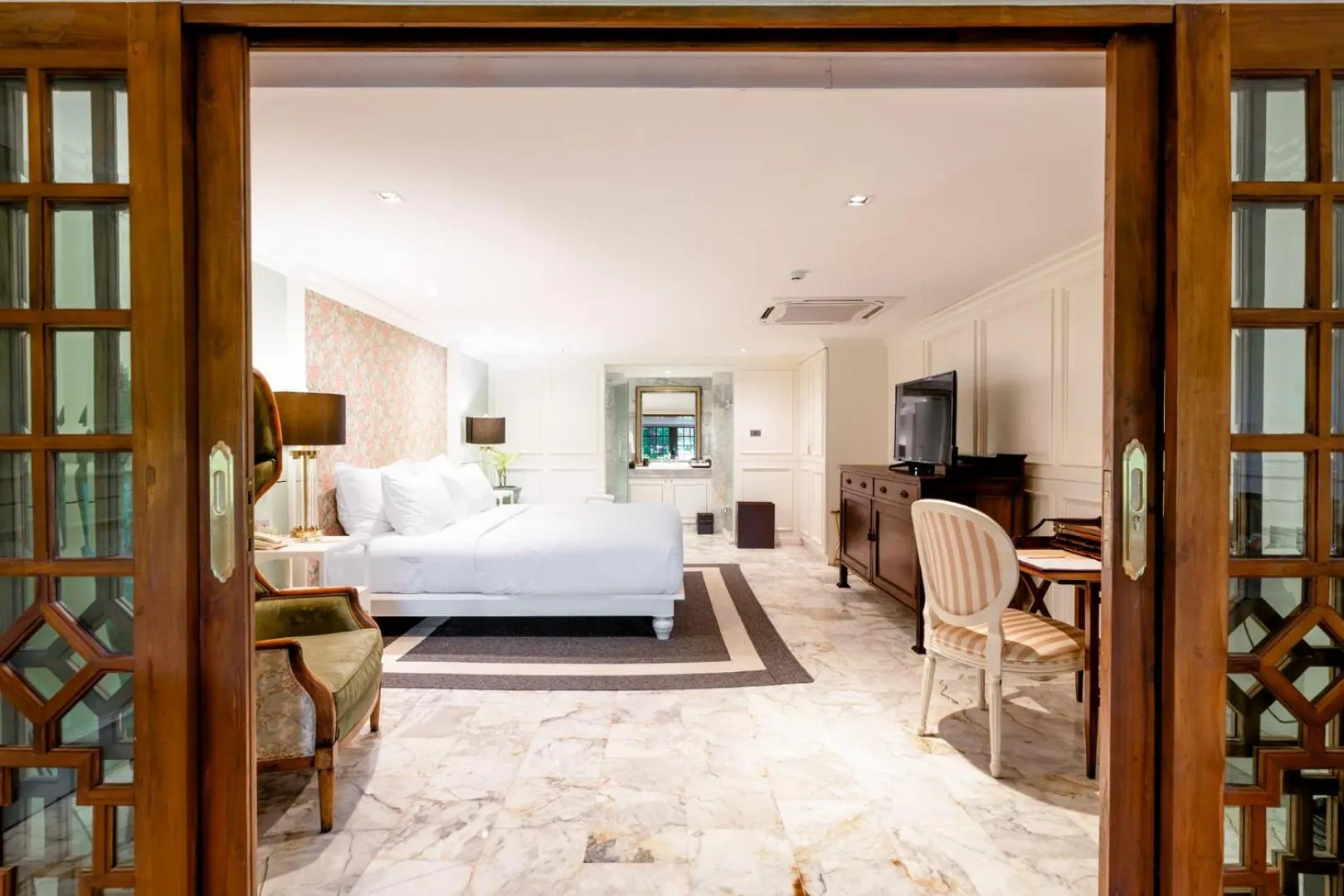 Bed in Chantra Khiri Chalet Chiang Mai