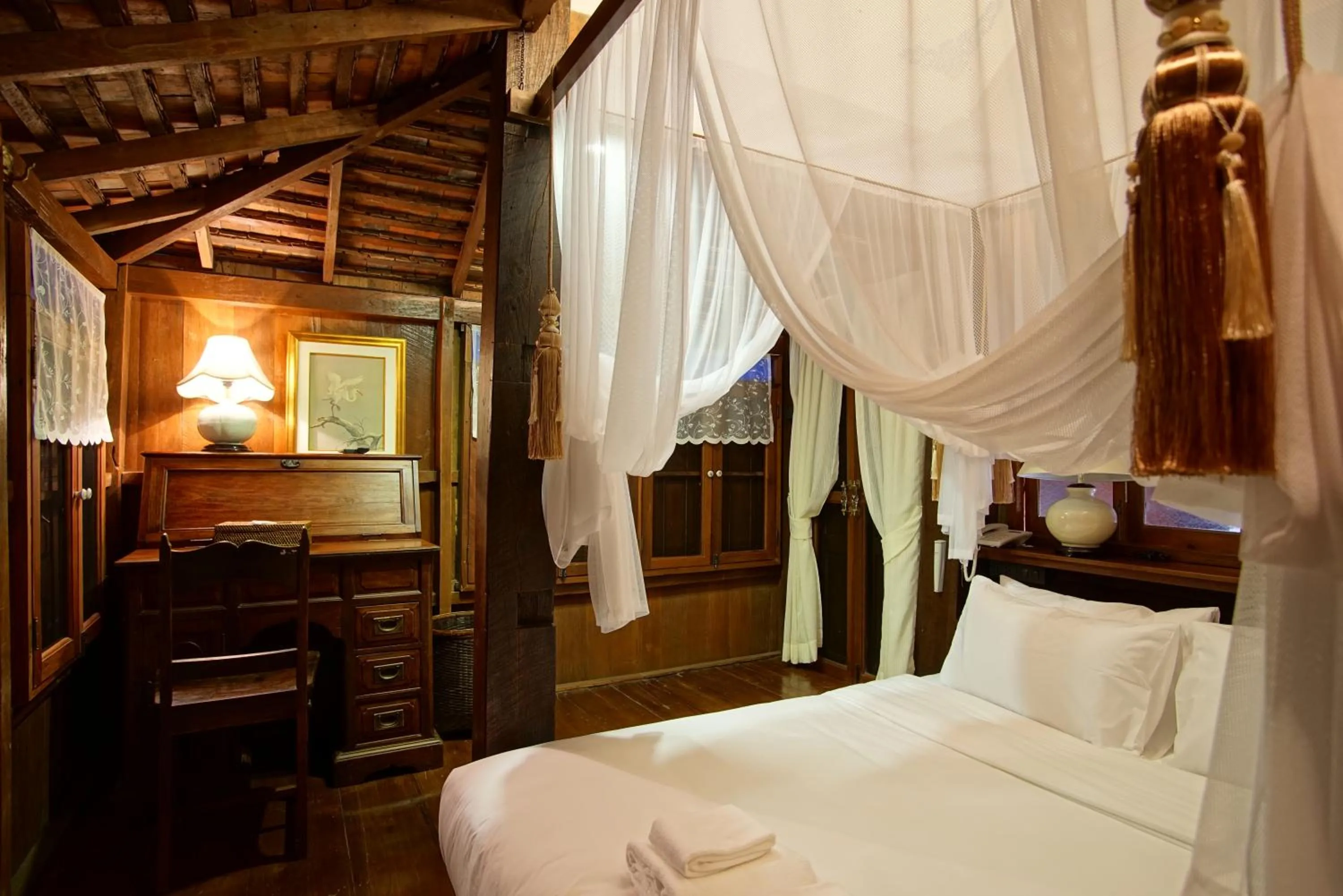 Bed in Chantra Khiri Chalet Chiang Mai