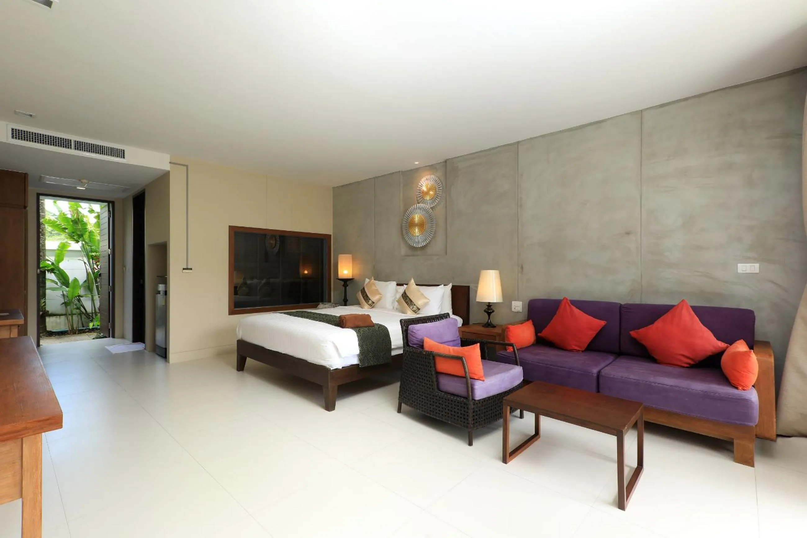 Seating area, Bed in Tea Tree Boutique Resort