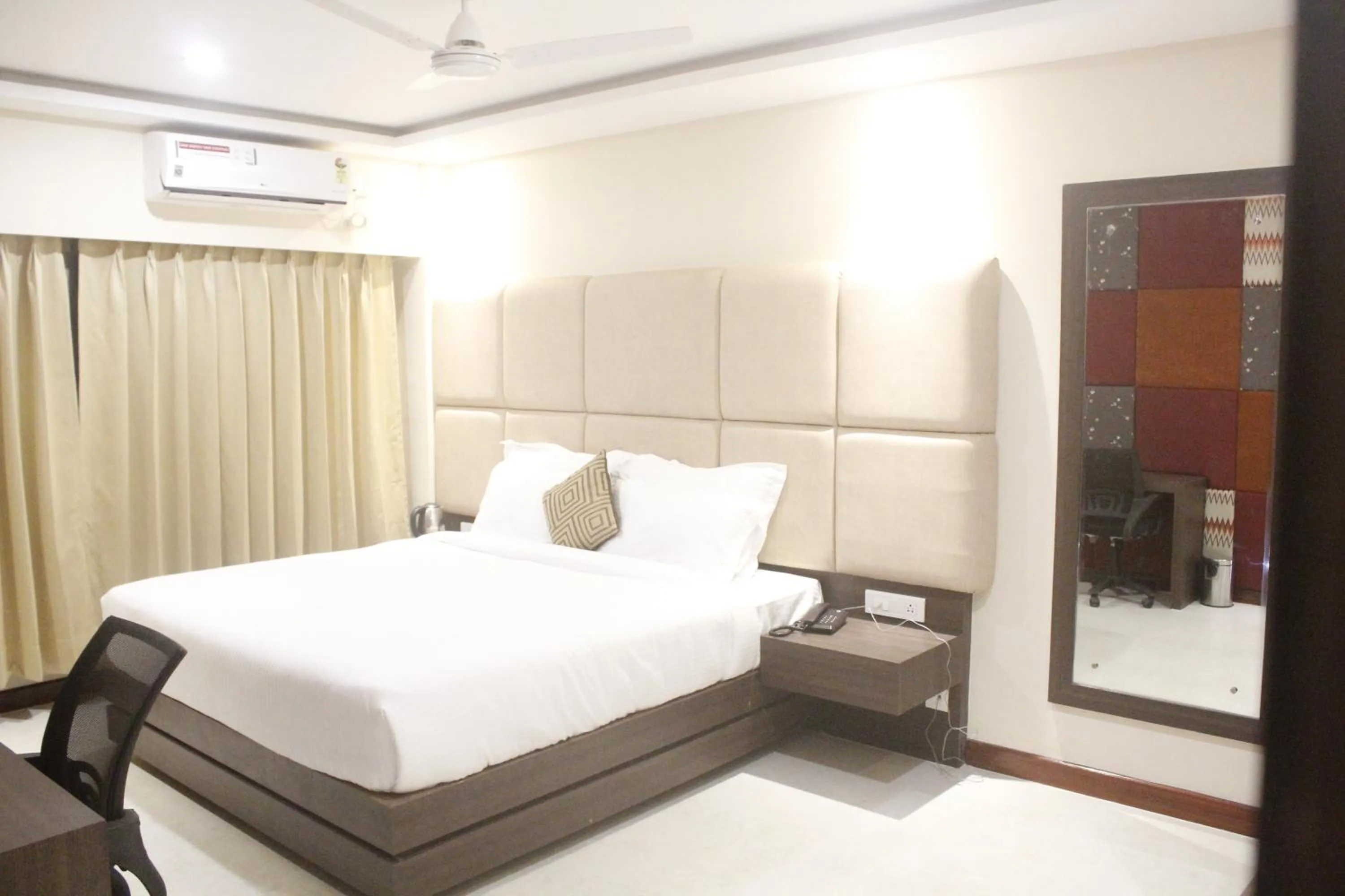 Bed in GK PALACE Pure VEG Hotel