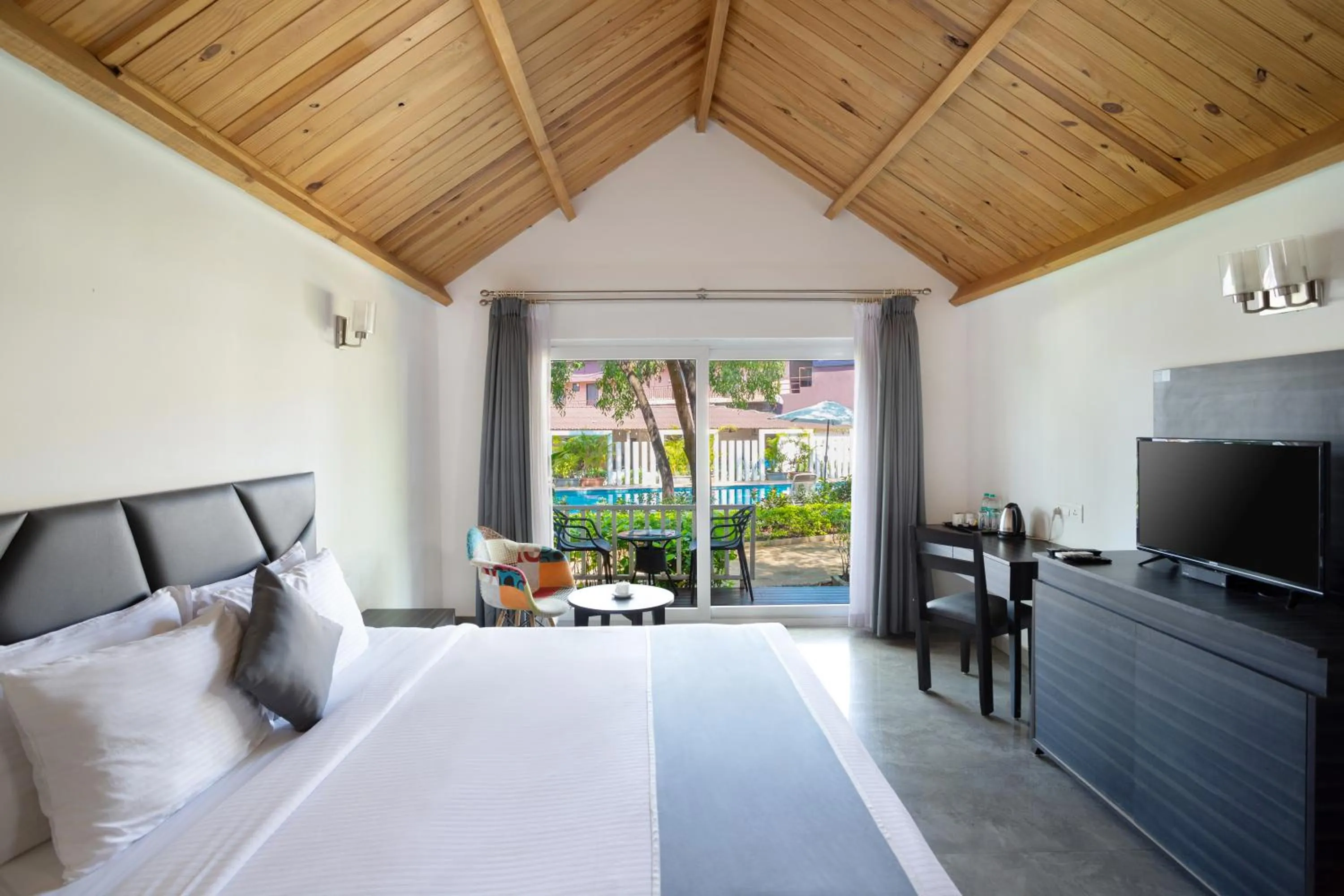 Bed in White Wood Resort By Stone Wood Hotels