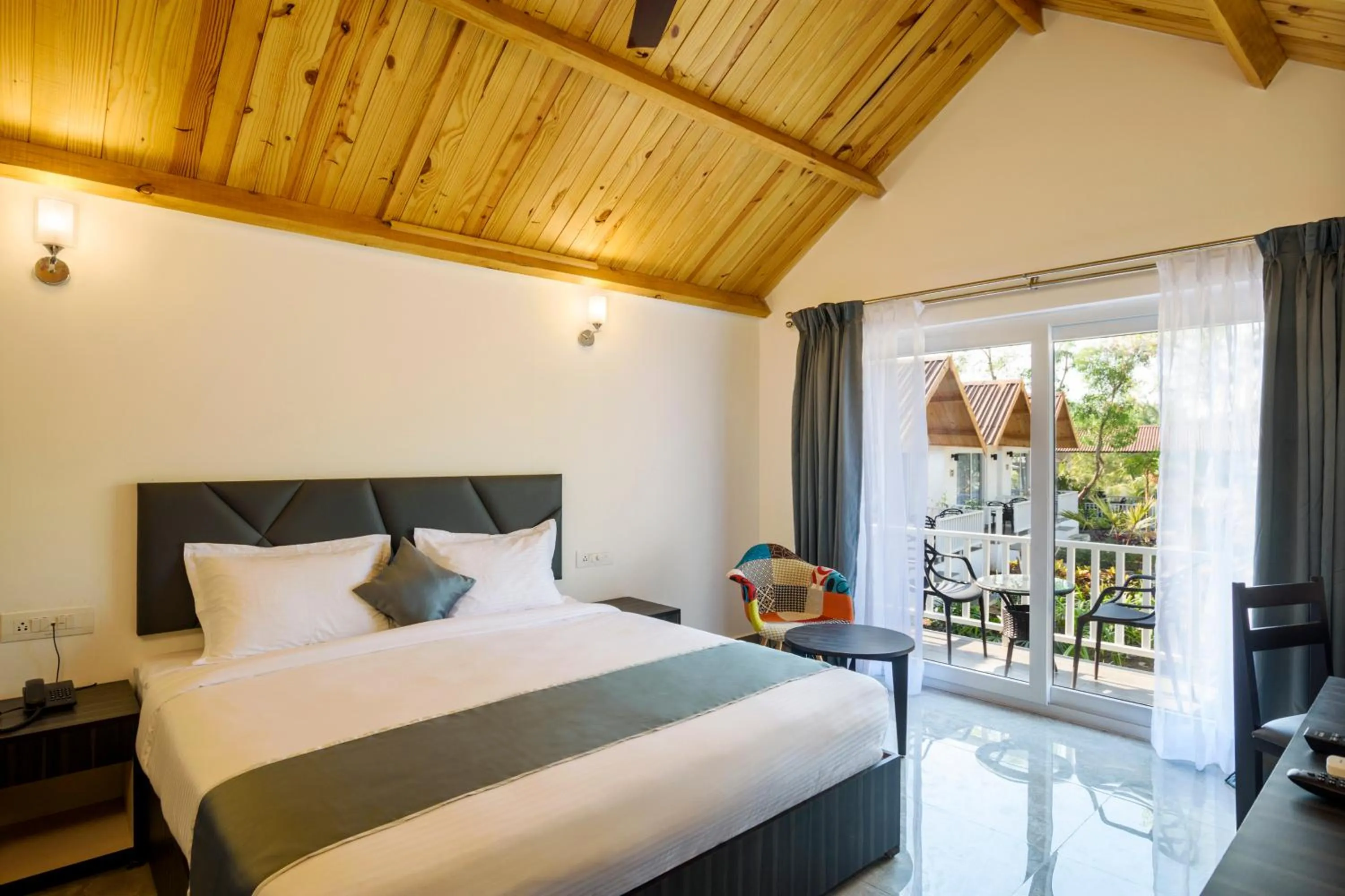 Bedroom, Bed in White Wood Resort By Stone Wood Hotels