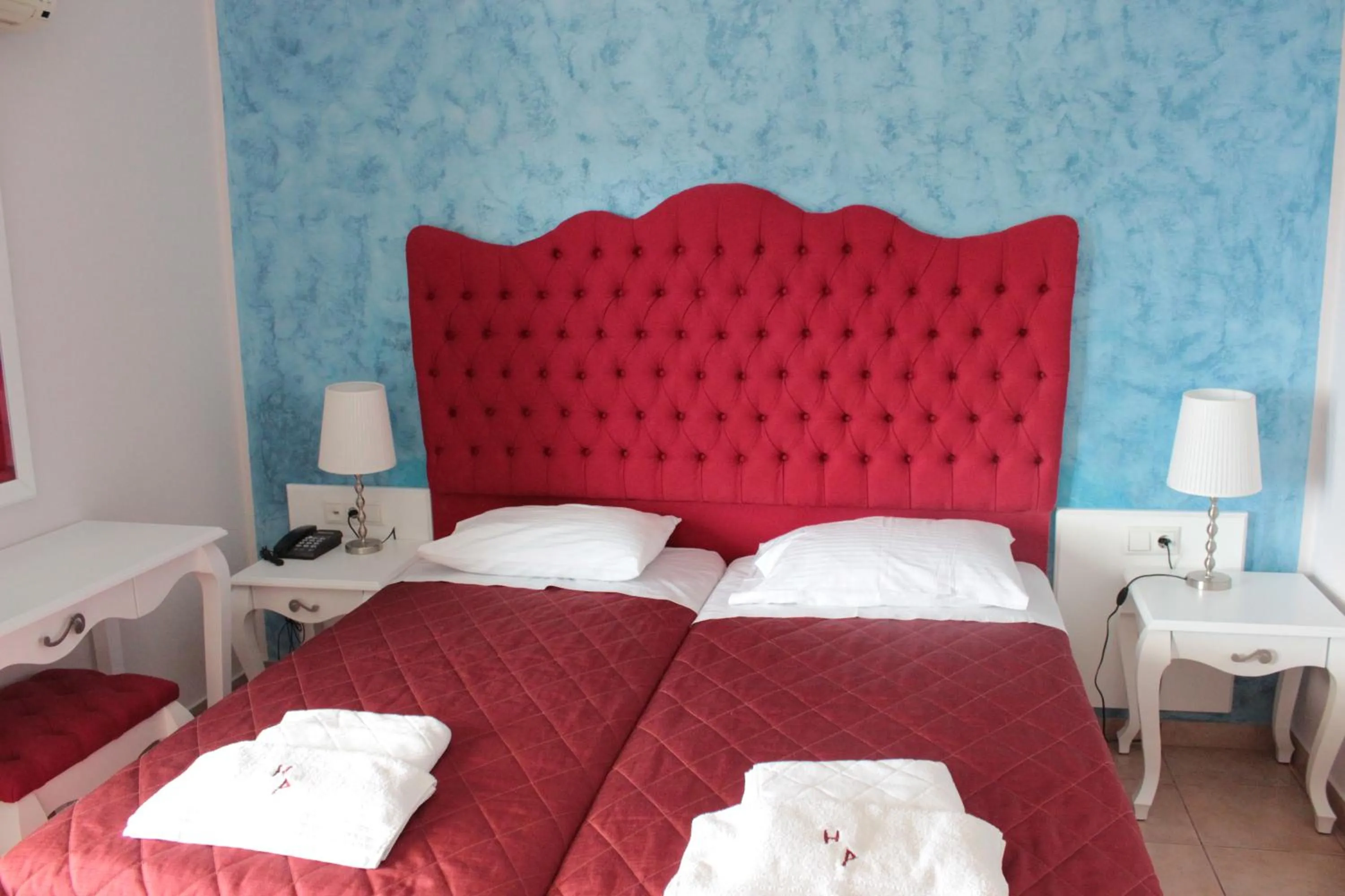 Bed in Palatino Hotel