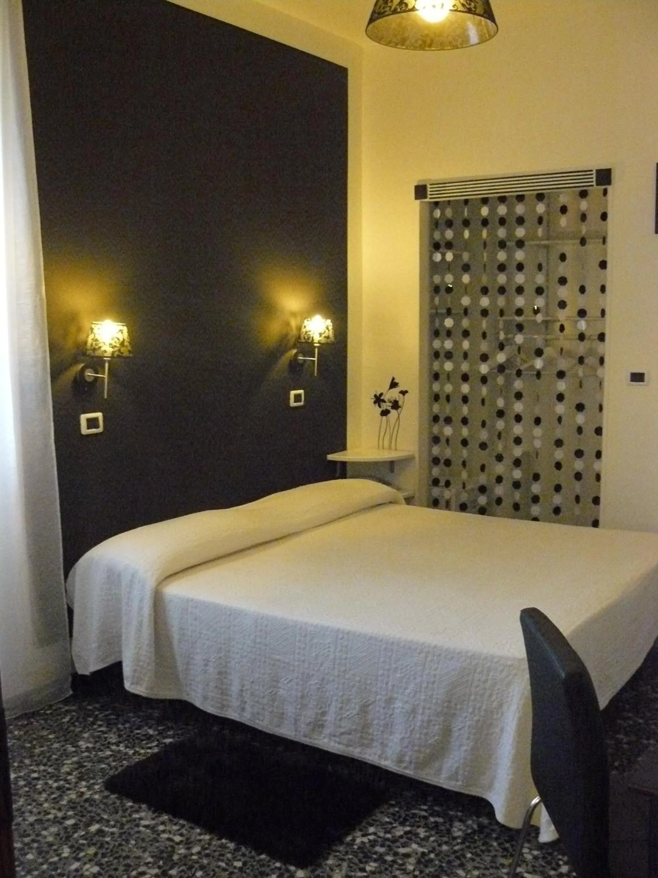 Bed in Hotel Vittoriano