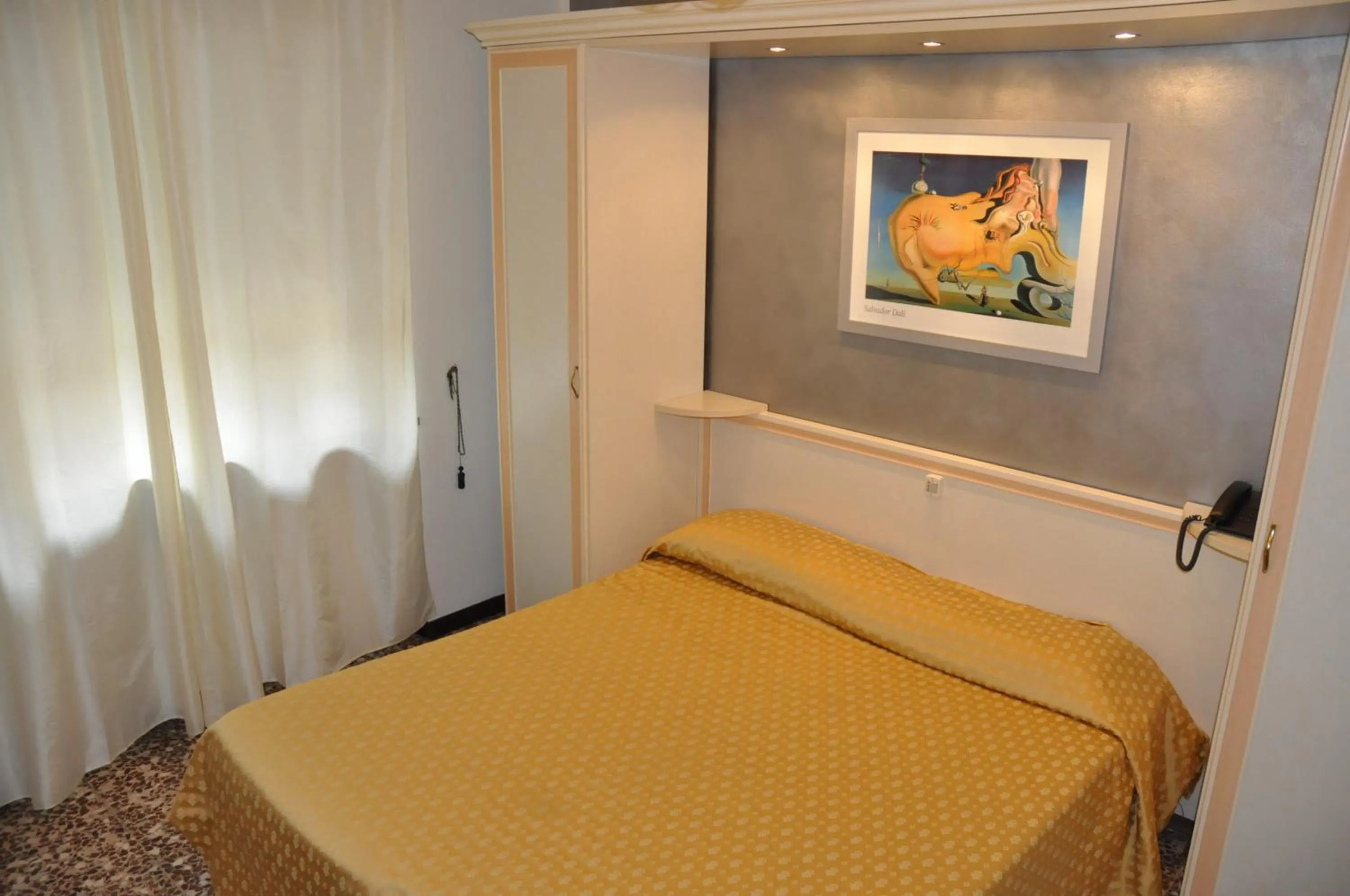 Bed in Hotel Vittoriano