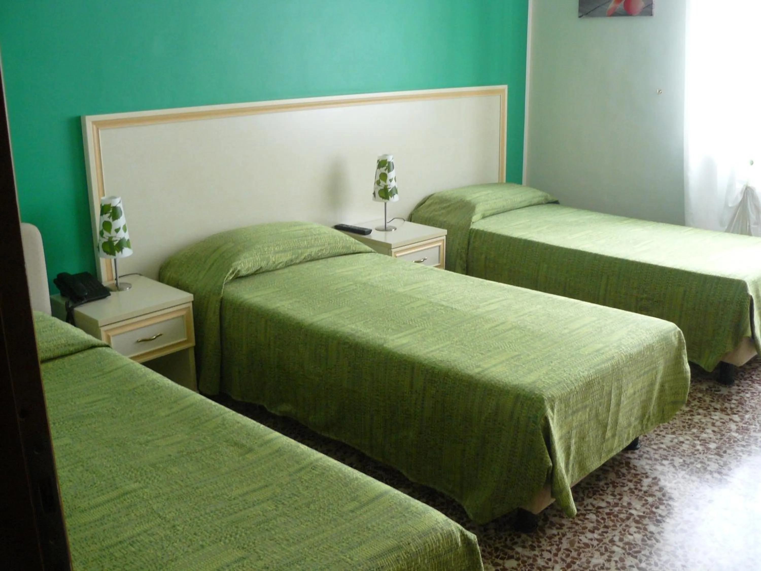 Bed in Hotel Vittoriano