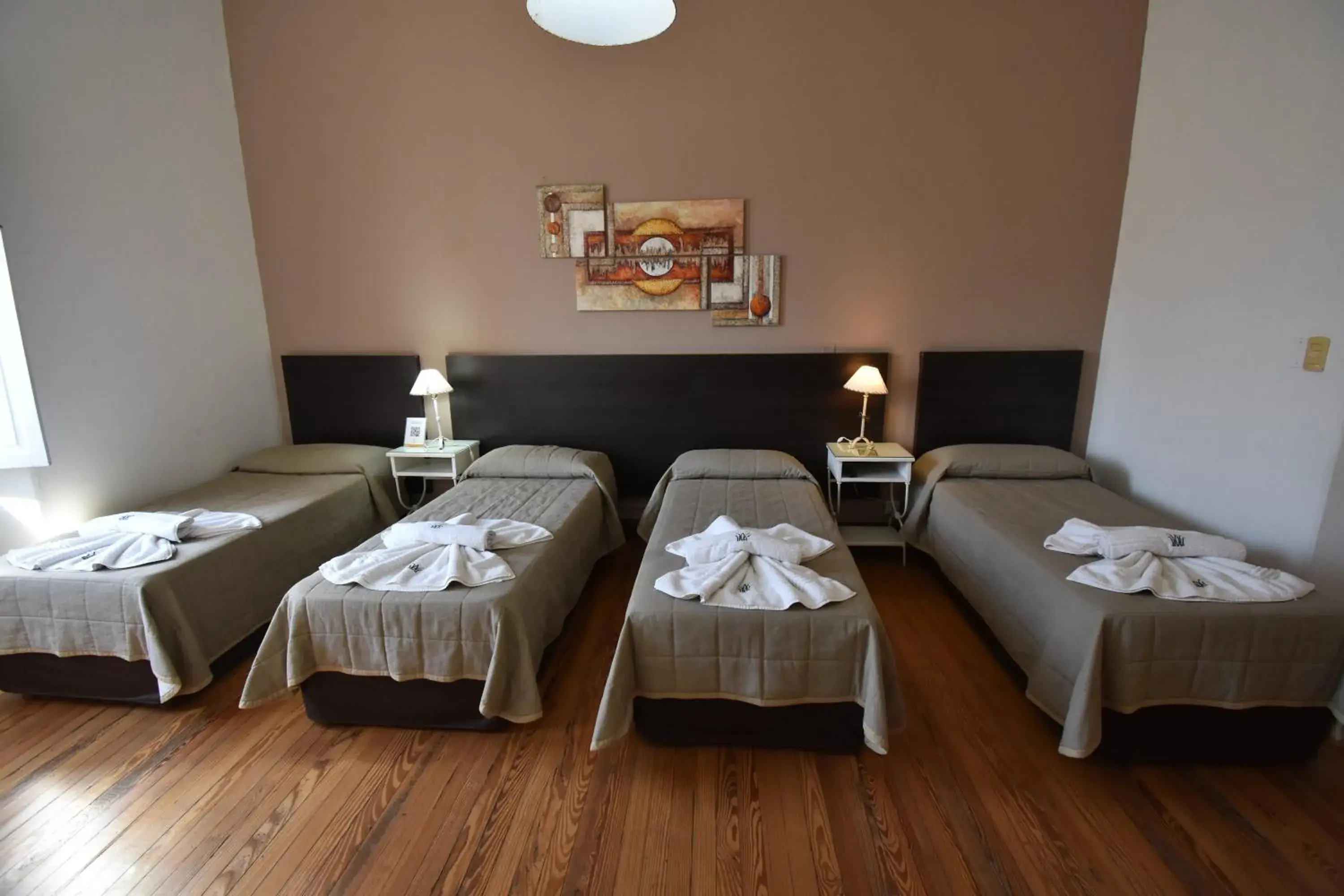 Deluxe Quadruple Room in Hotel Plaza Deluxe Quadruple Room in Hotel Plaza