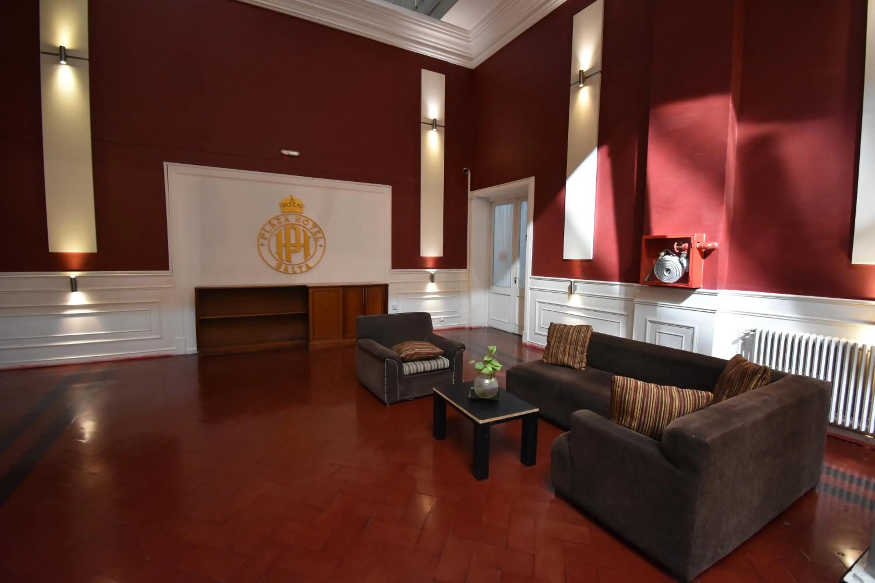 Property logo or sign in Hotel Plaza