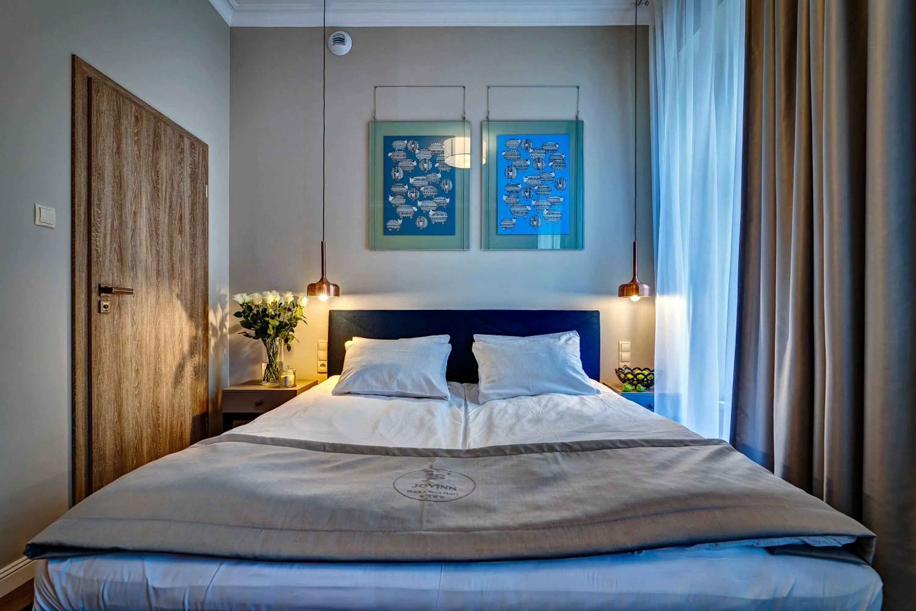 Bed in Joyinn Aparthotel