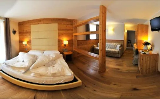 Bed in Bio Hotel Brusago Vital & Wellness