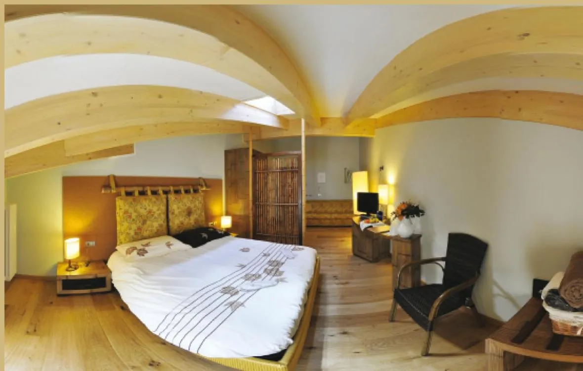 Bed in Bio Hotel Brusago Vital & Wellness