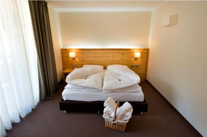 Bed in Bio Hotel Brusago Vital & Wellness