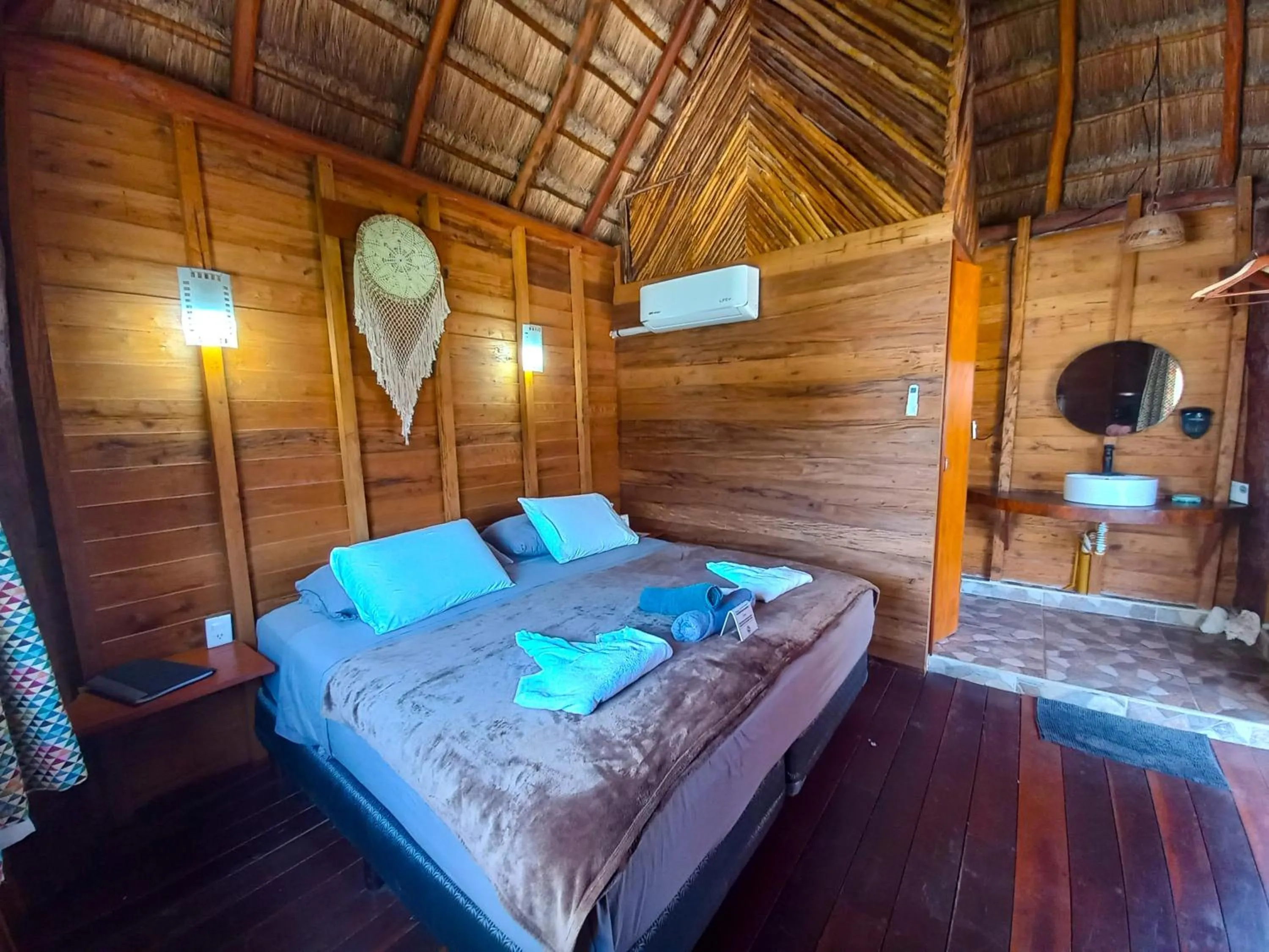 Bed in Palmeras de Mahahual Cabañas