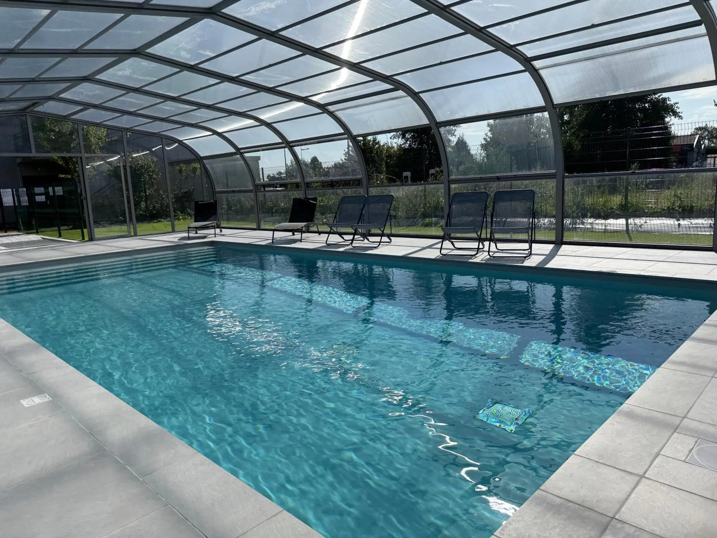 Pool view in ibis Pontorson Baie Du Mont Saint Michel Pool view in ibis Pontorson Baie Du Mont Saint Michel