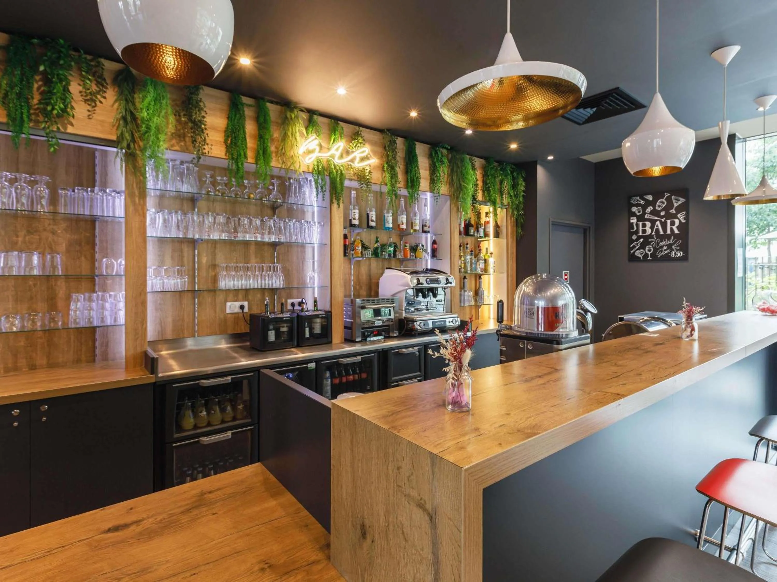 Lounge or bar in ibis Lyon Carre De Soie