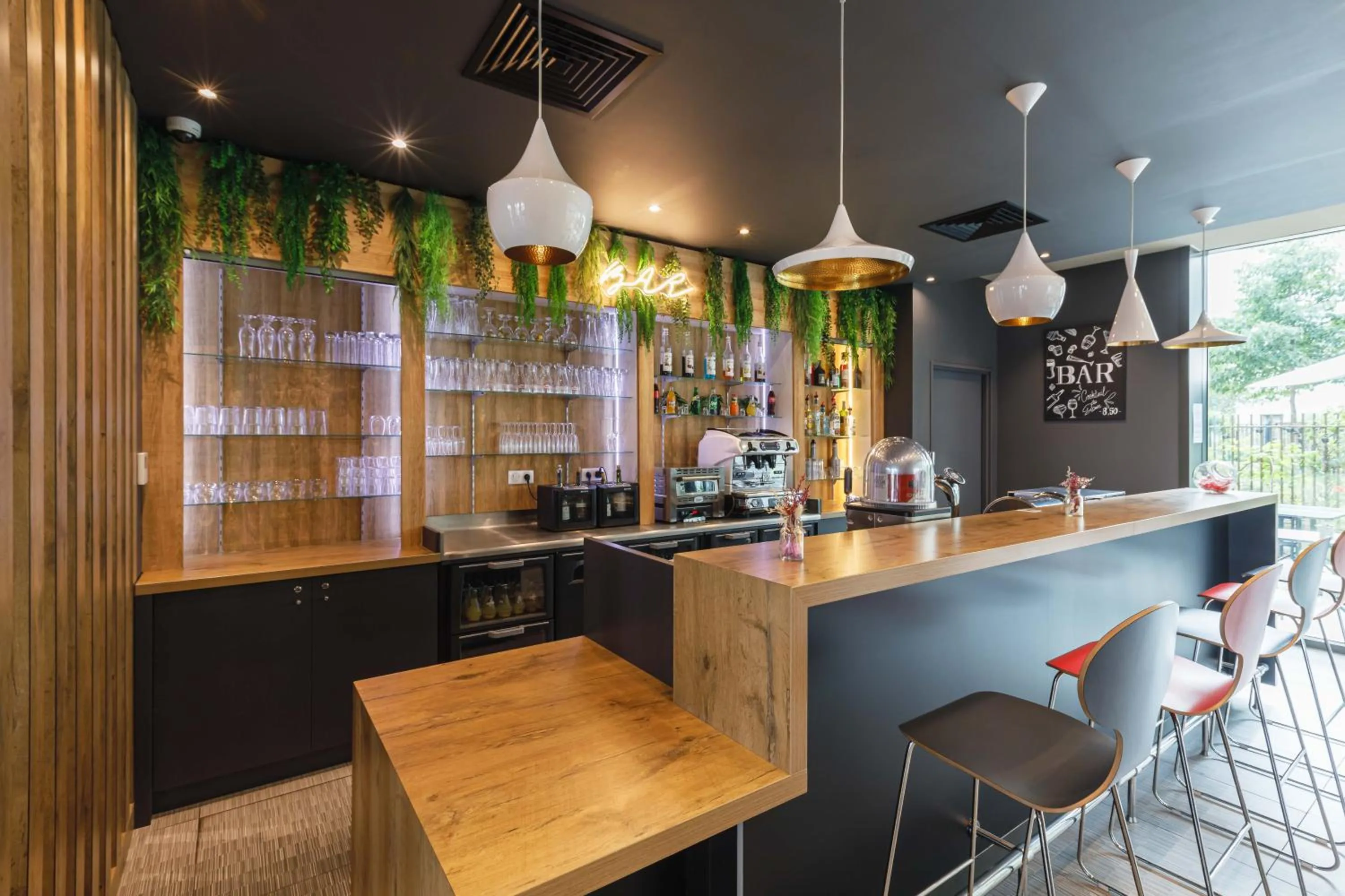 Lounge or bar in ibis Lyon Carre De Soie