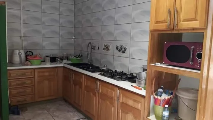 Kitchen or kitchenette in Auberge bouloulou