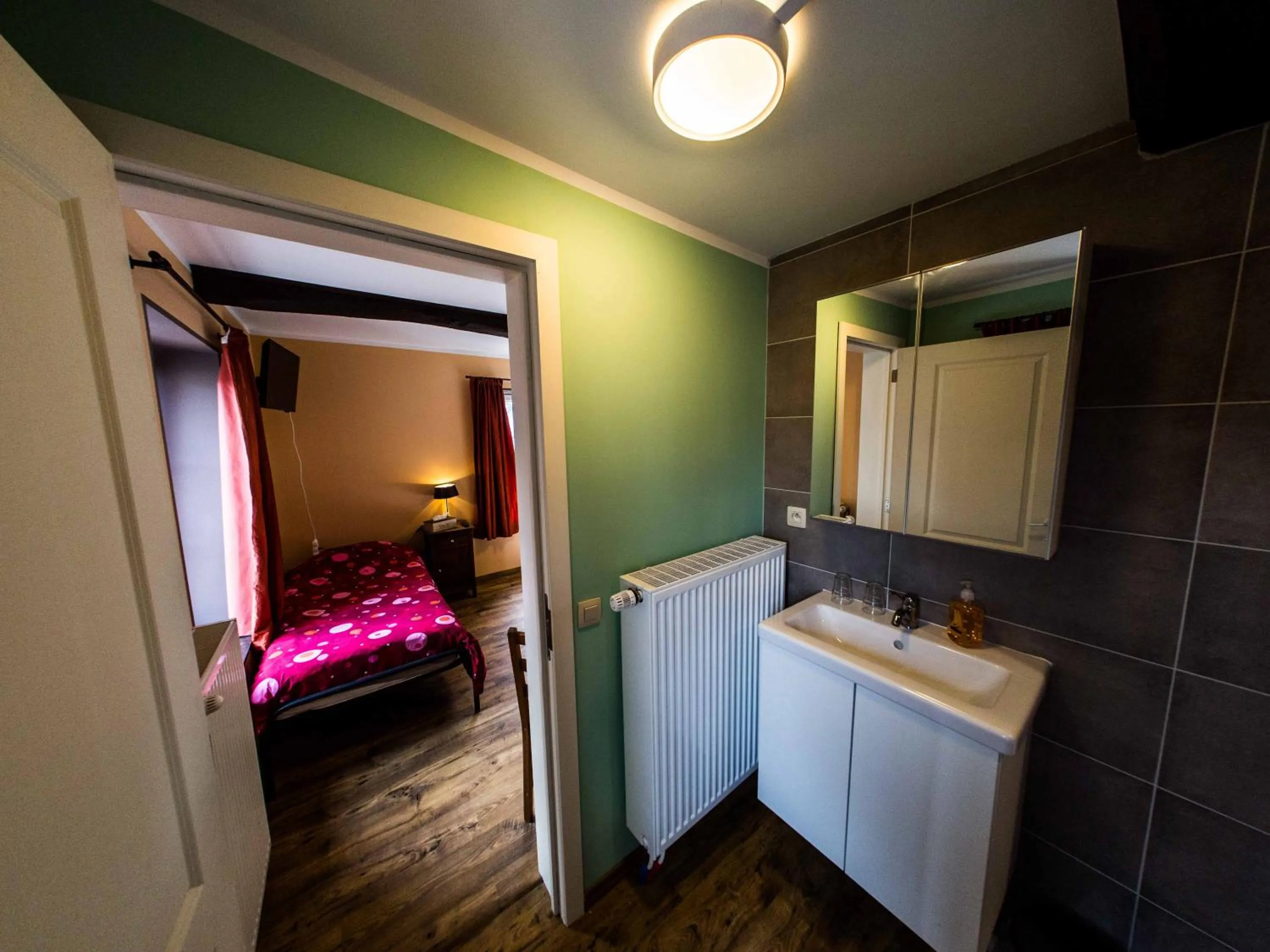 Bed in B&B Aux 10 Clefs