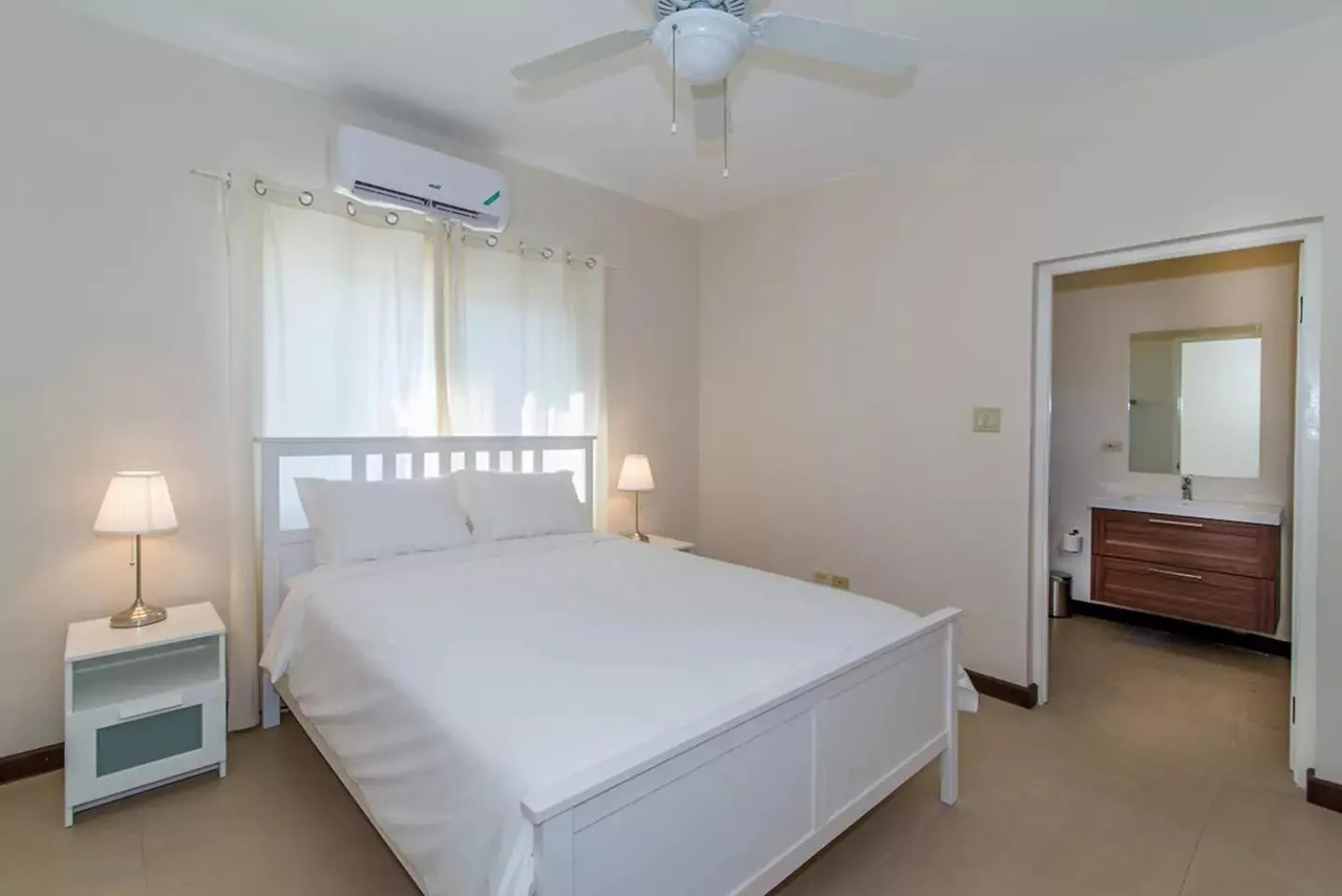 Bedroom, Bed in Luxury 2BR Home facing Beach w/Pool Montego Bay #4