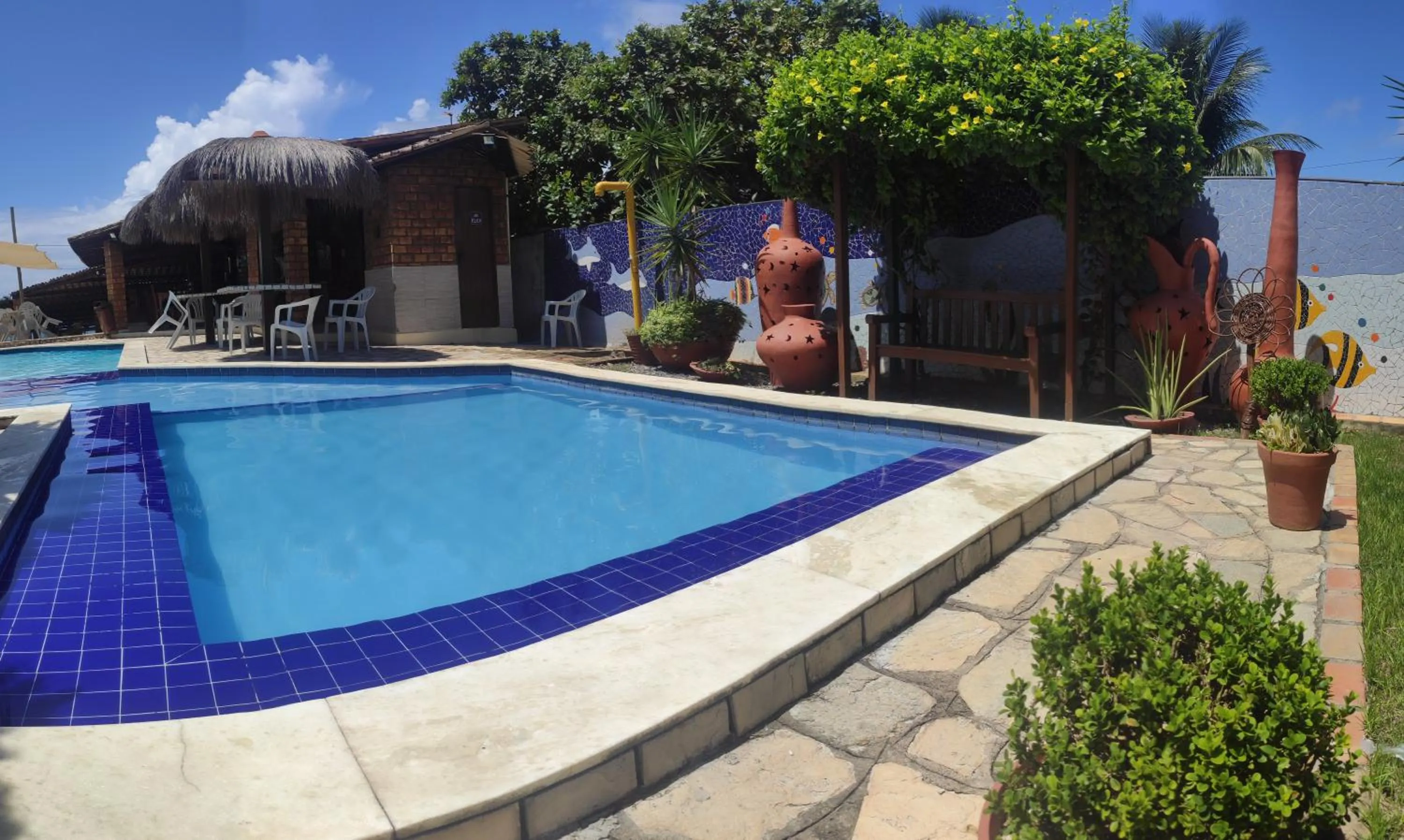 Swimming pool in Pousada Enseada do Sol