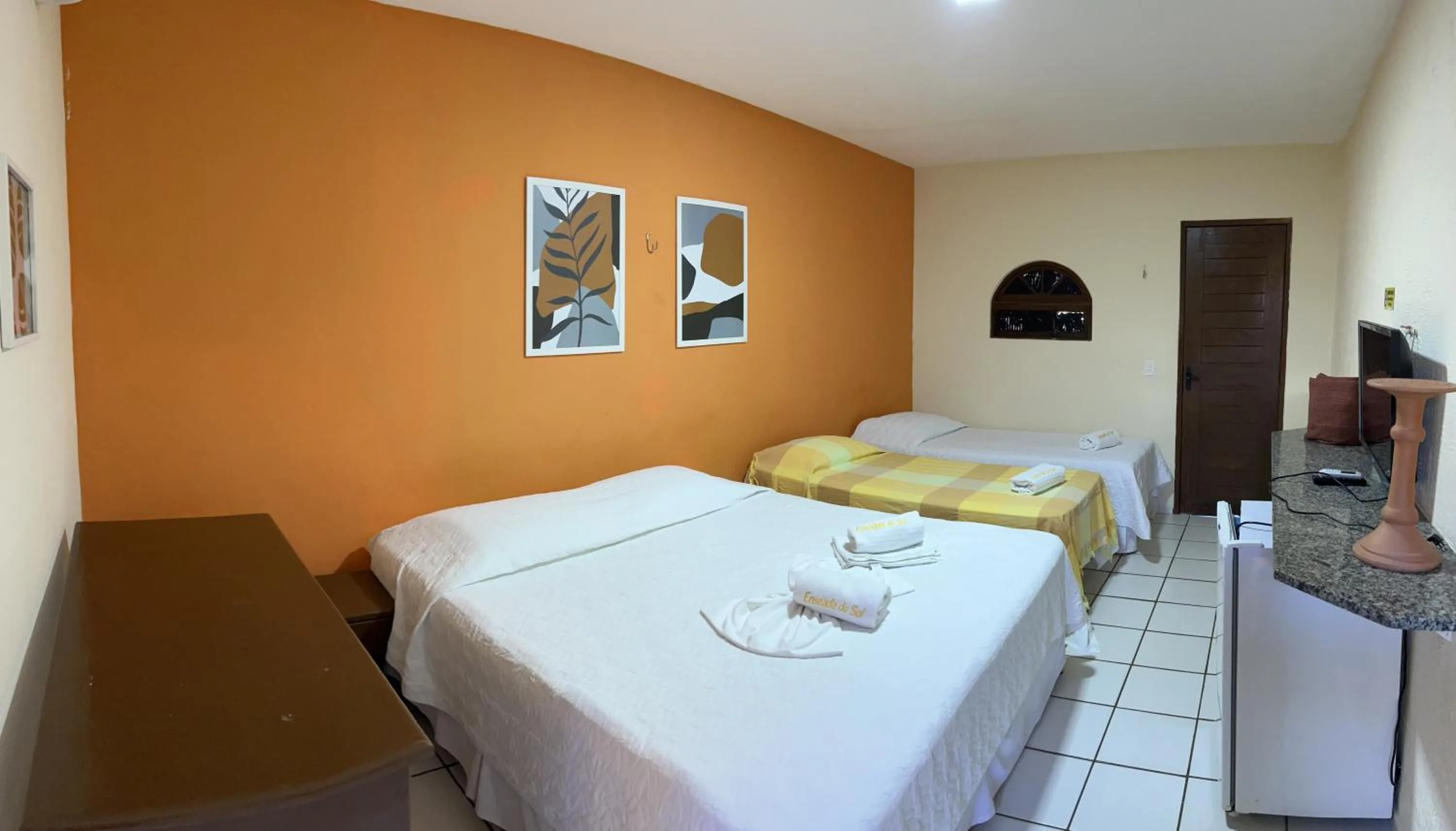 Bed in Pousada Enseada do Sol