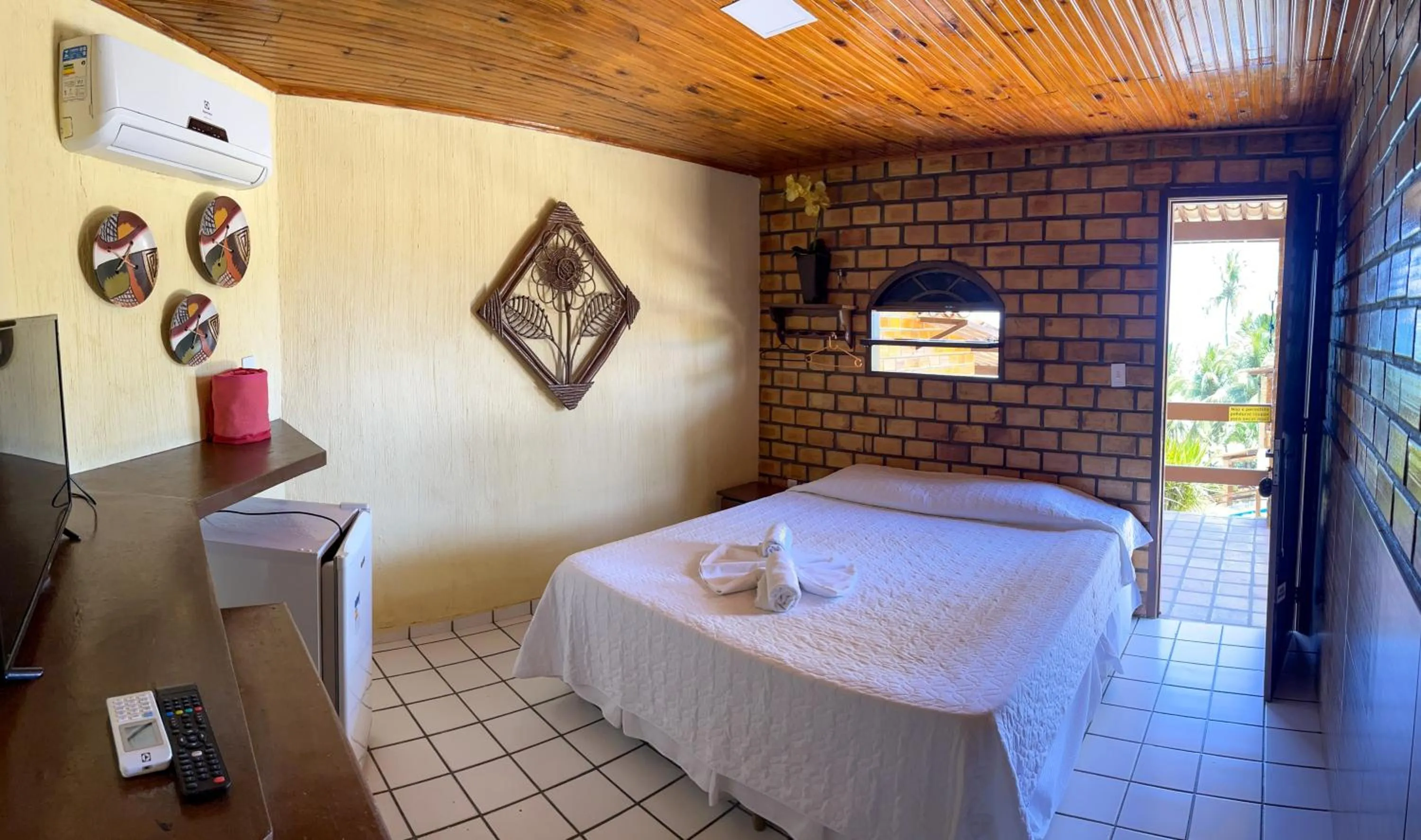 Bed in Pousada Enseada do Sol