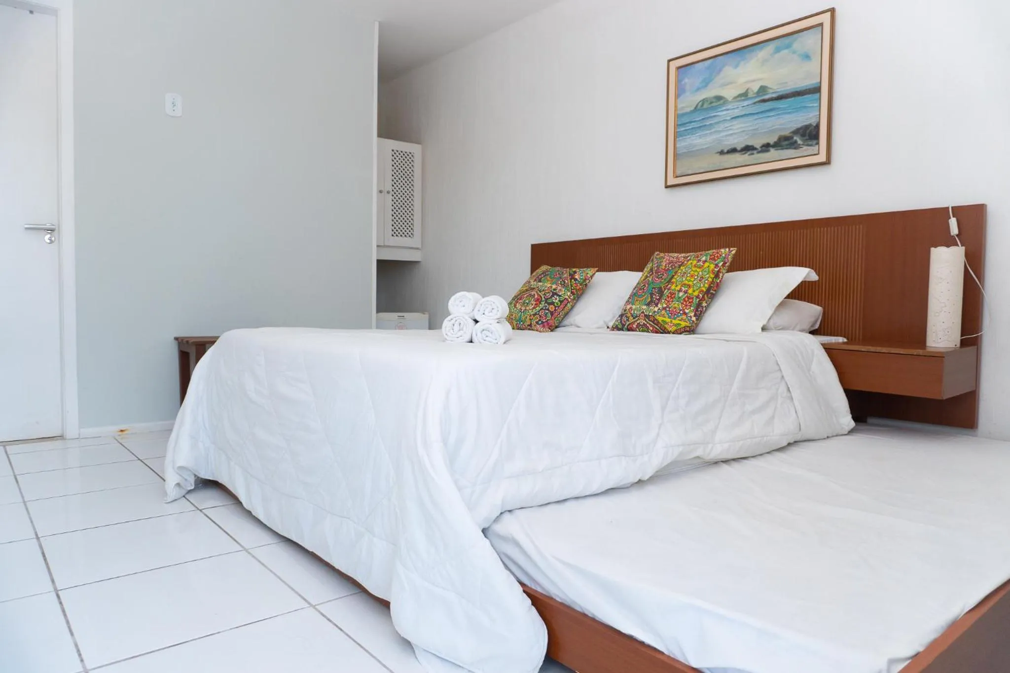 Bed in Pousada Marilia