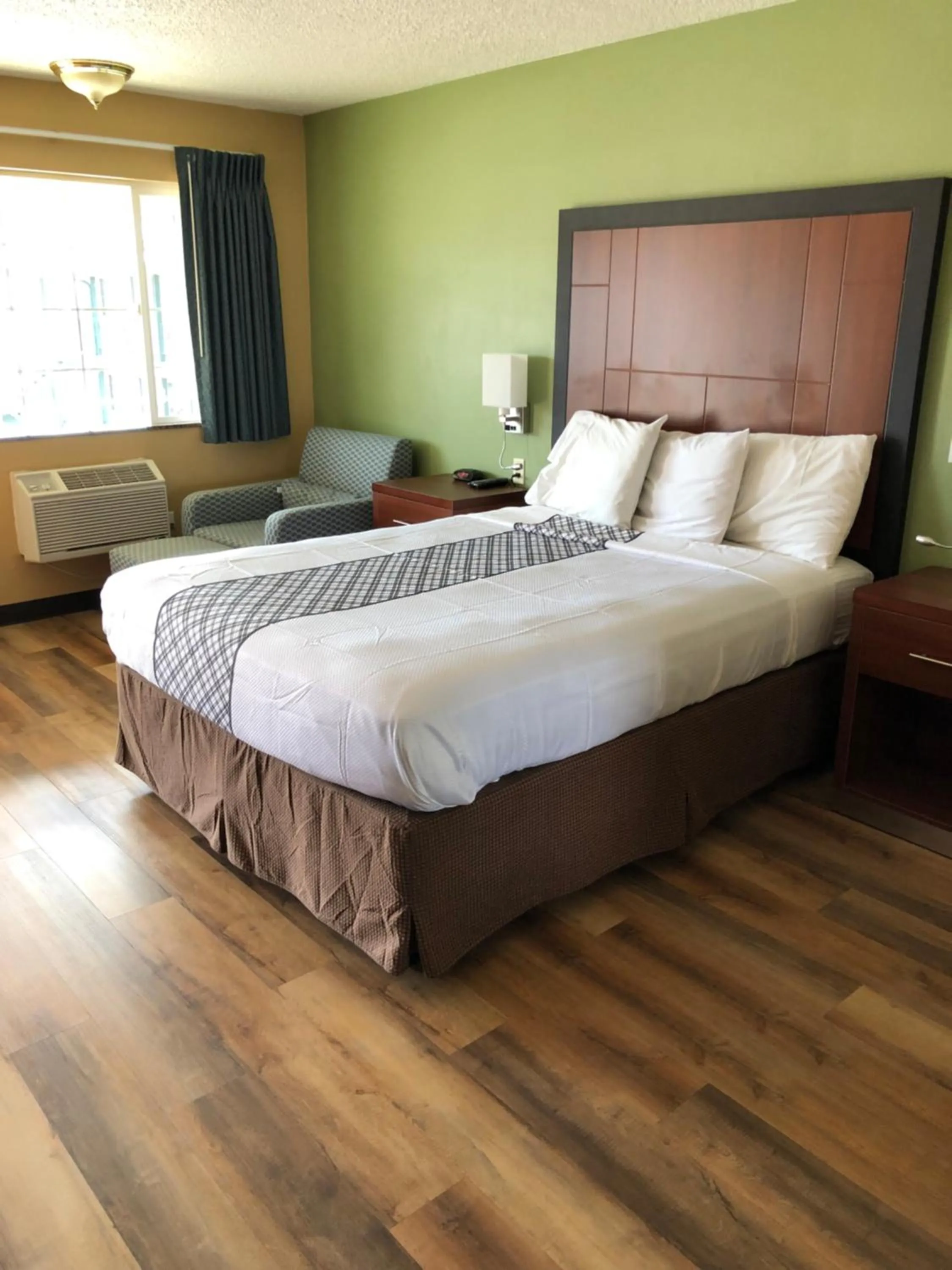 Bed in Knights Inn Motel