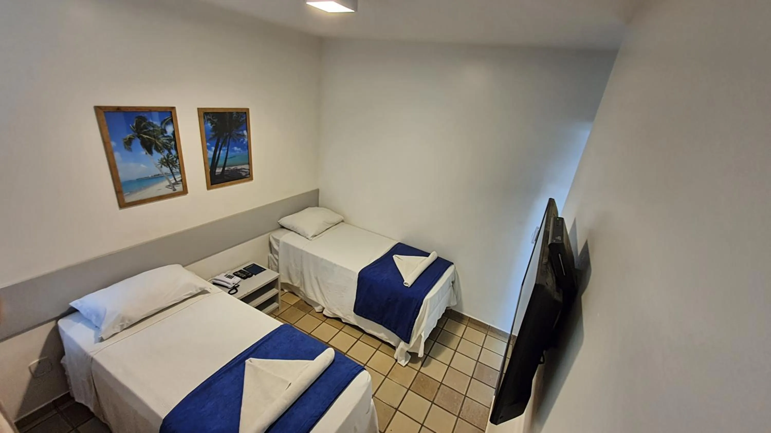 Bed in Bluemar Hotel