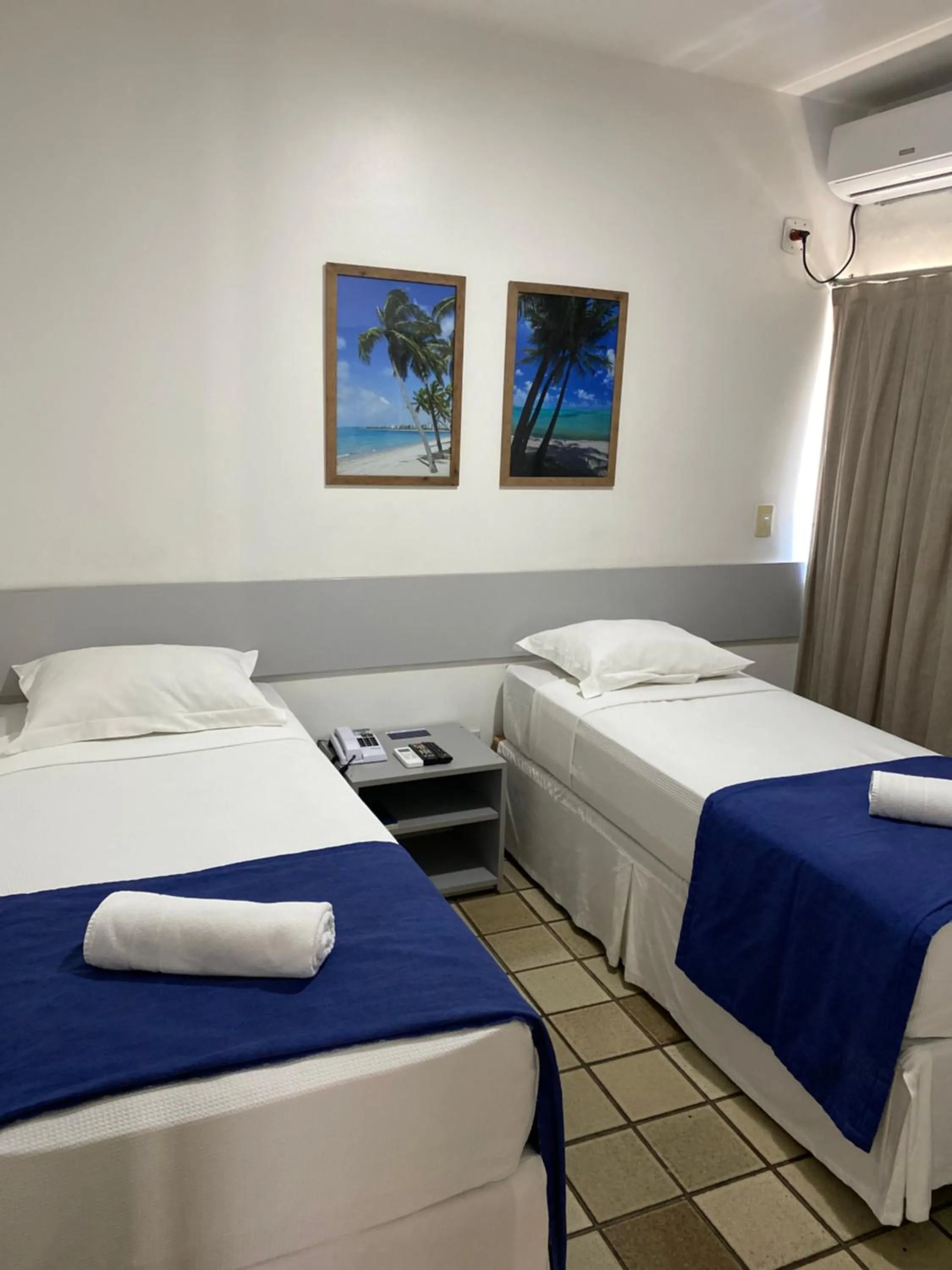 Bed in Bluemar Hotel