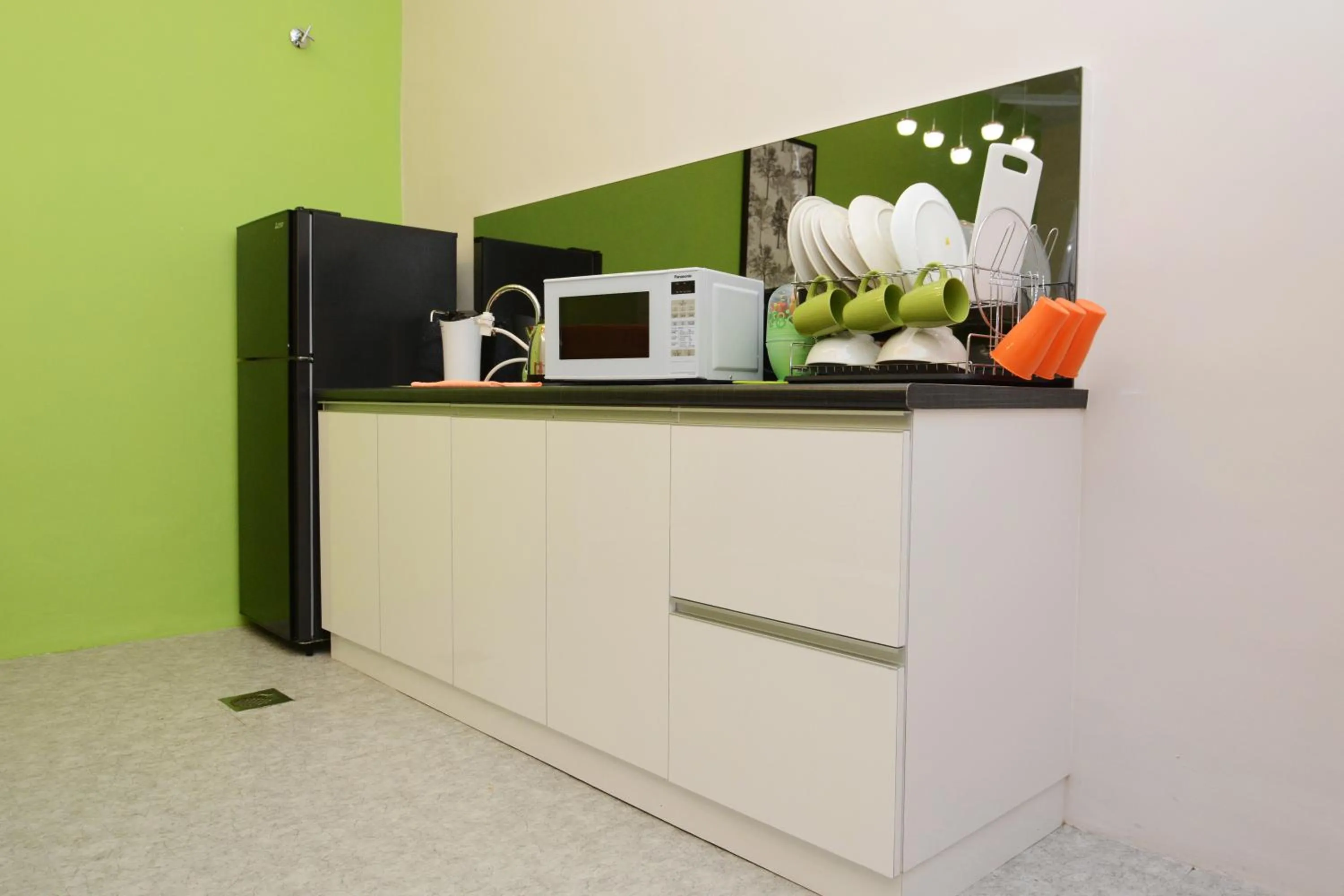 Kitchen or kitchenette in Eco Garden Hotel