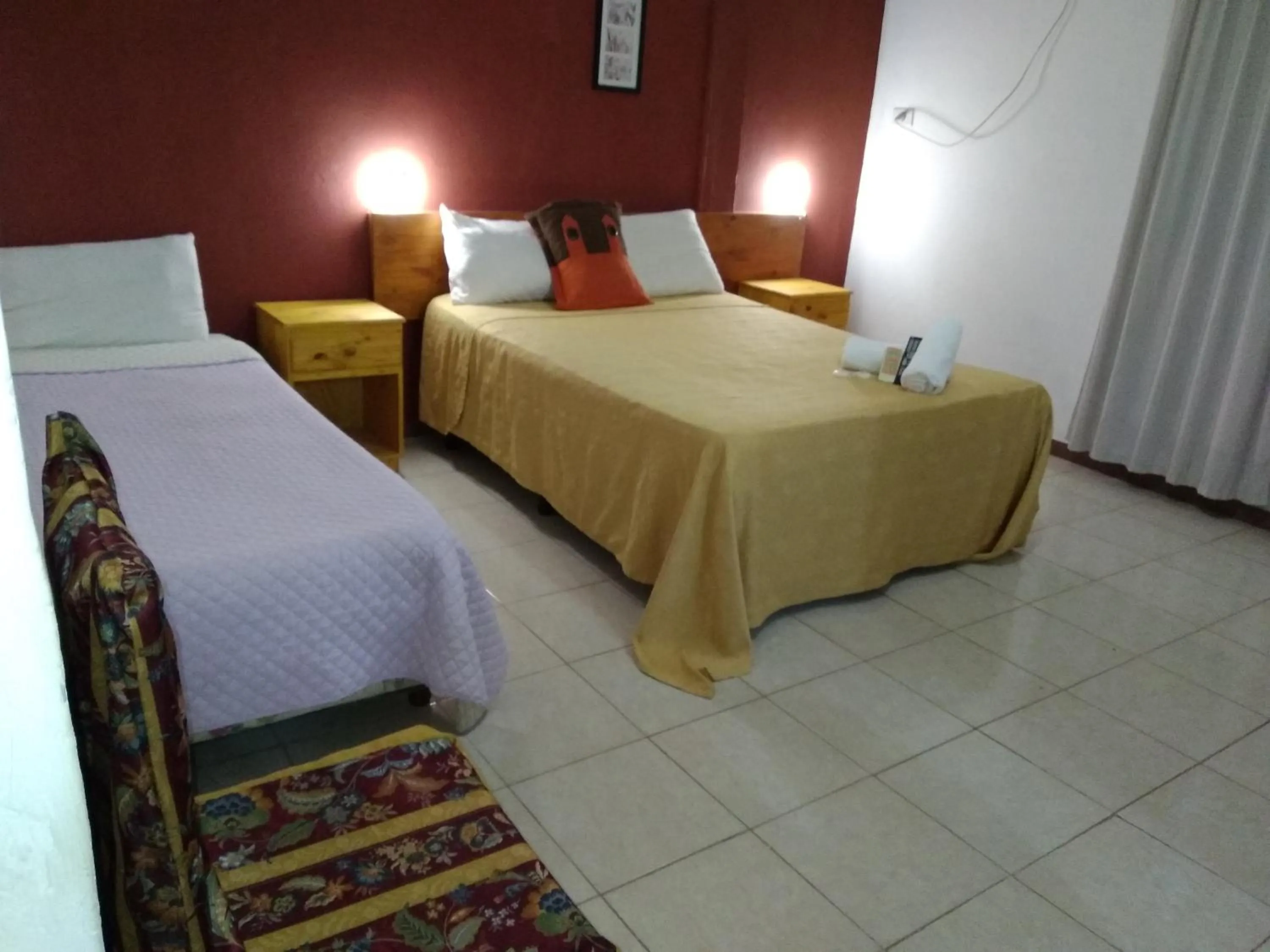 Bed in Petit Hotel Panambi